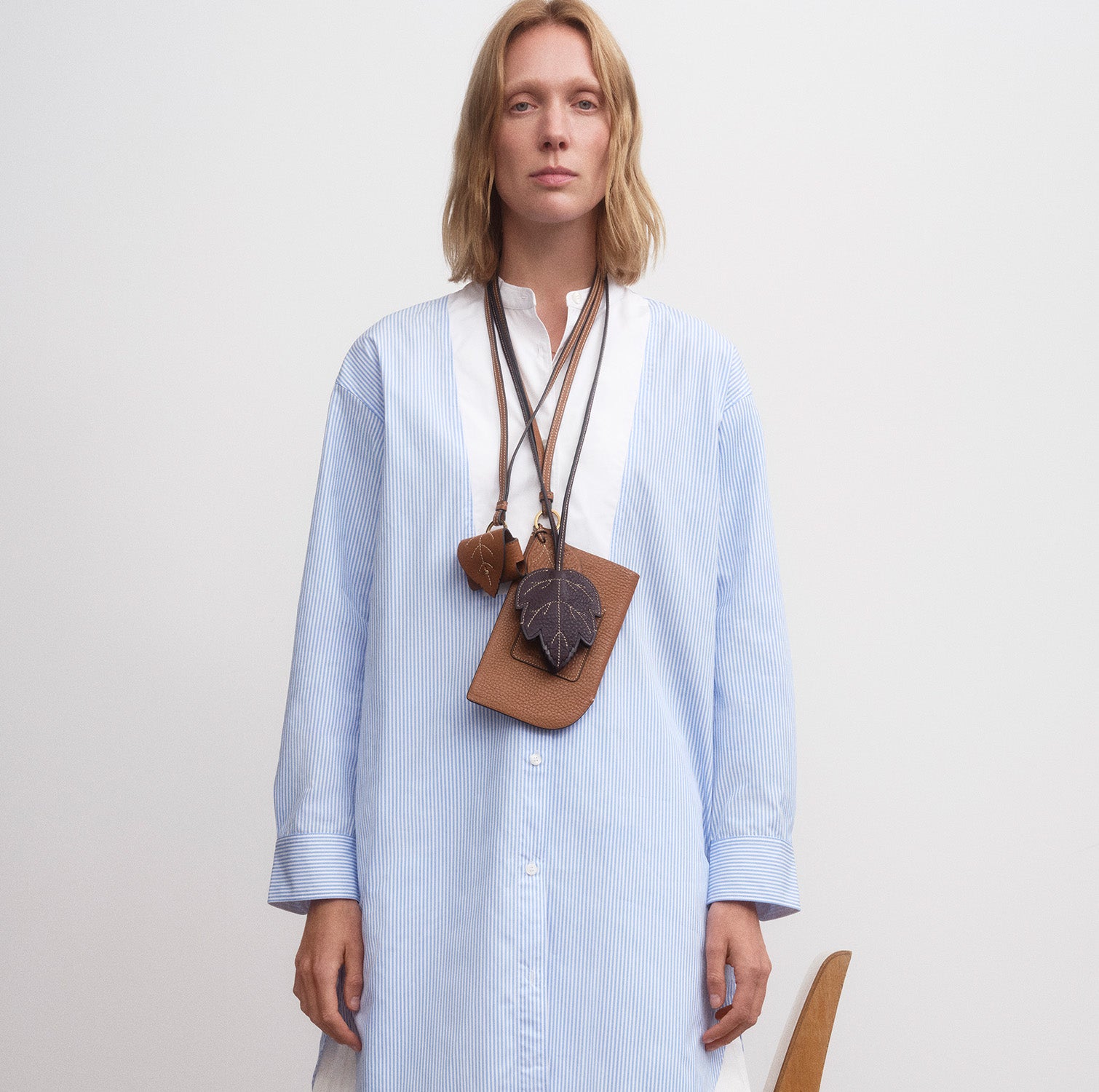 RTN Earphone Case -

          
            Natural Grain Leather in Pecan -
          

          Anya Hindmarch EU
