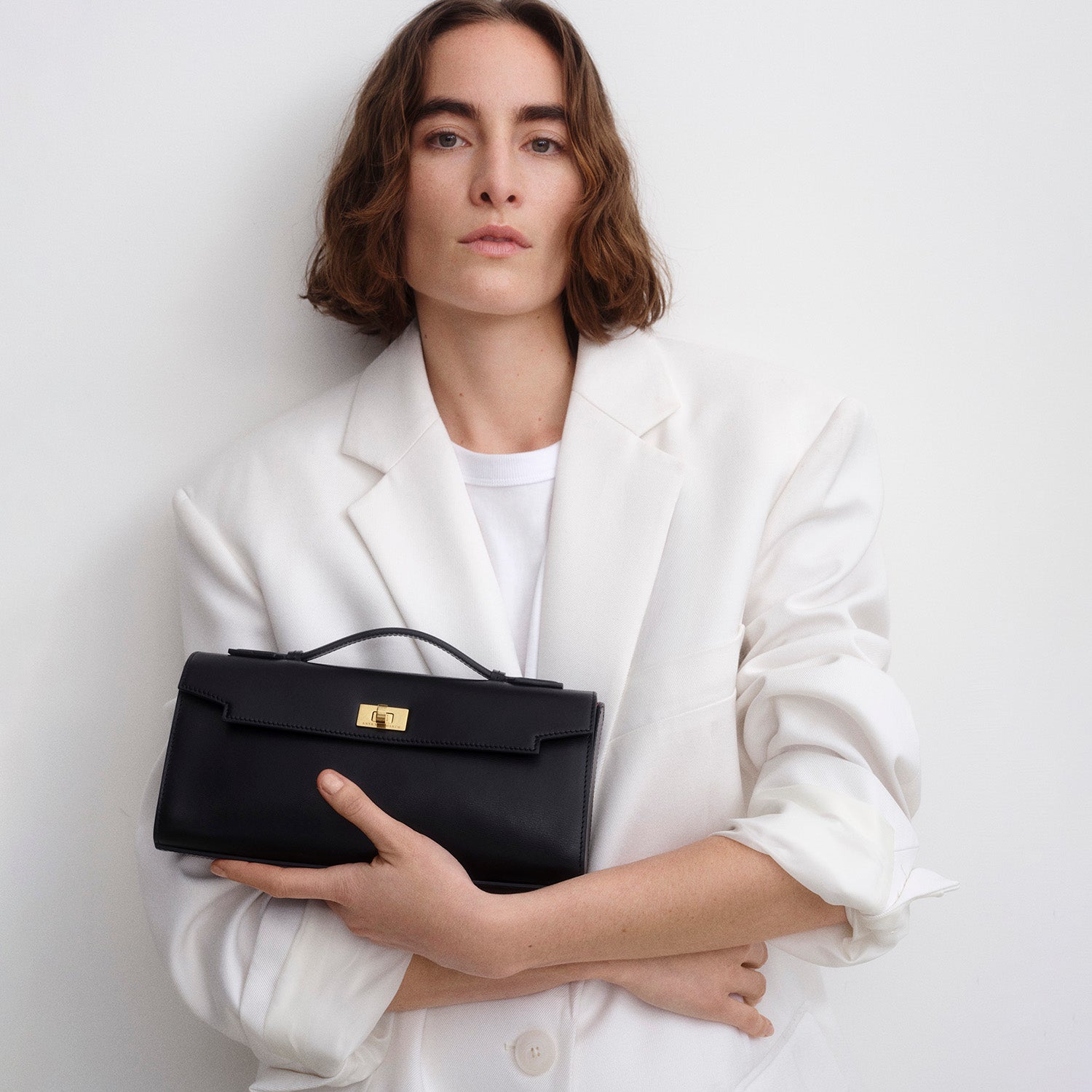 Mortimer Clutch -

          
            Calf Leather in Black -
          

          Anya Hindmarch EU
