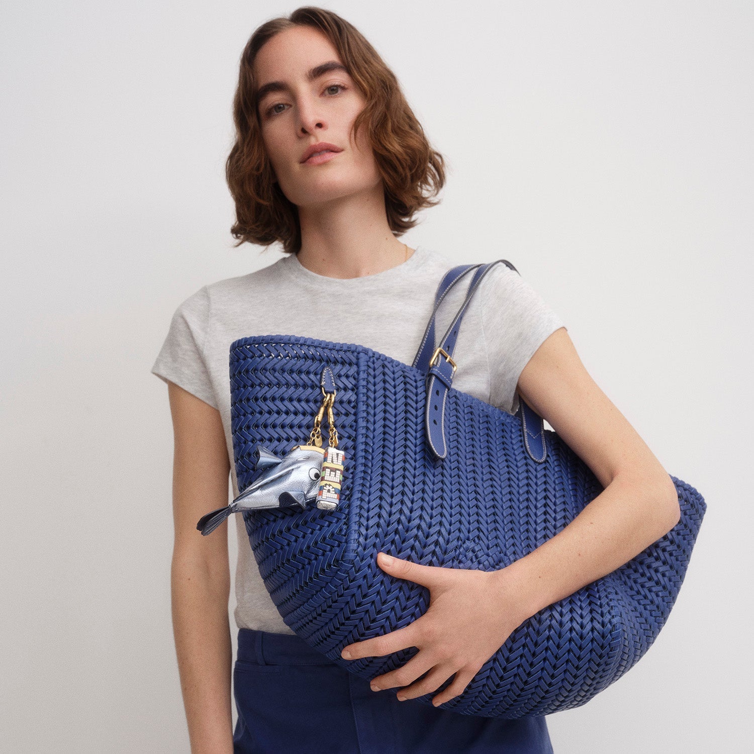 Blue leather stitch tote bag by Anya Hindmarch