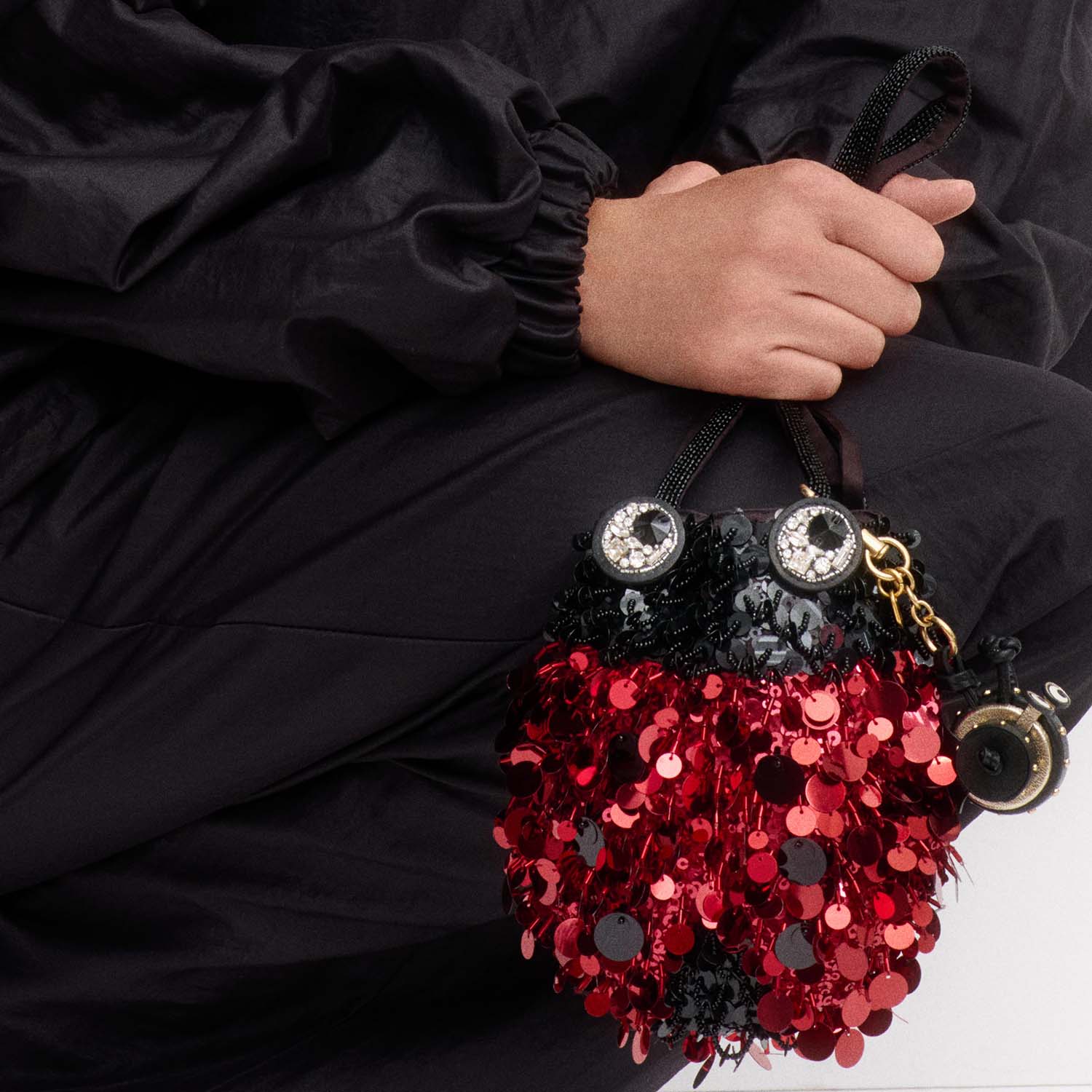 Ladybird Mini Bucket Bag -

          
            Sequins in black and red -
          

          Anya Hindmarch EU
