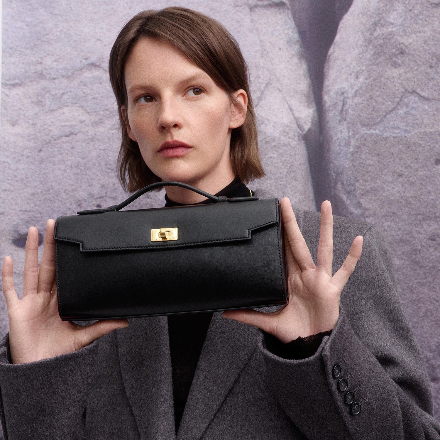 Mortimer Clutch -

          
            Calf Leather in Black -
          

          Anya Hindmarch EU

