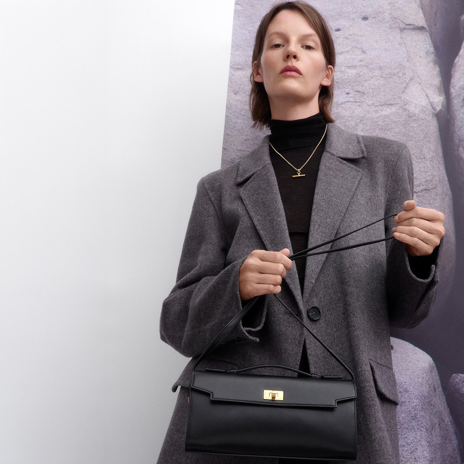 Mortimer Clutch -

          
            Calf Leather in Black -
          

          Anya Hindmarch EU
