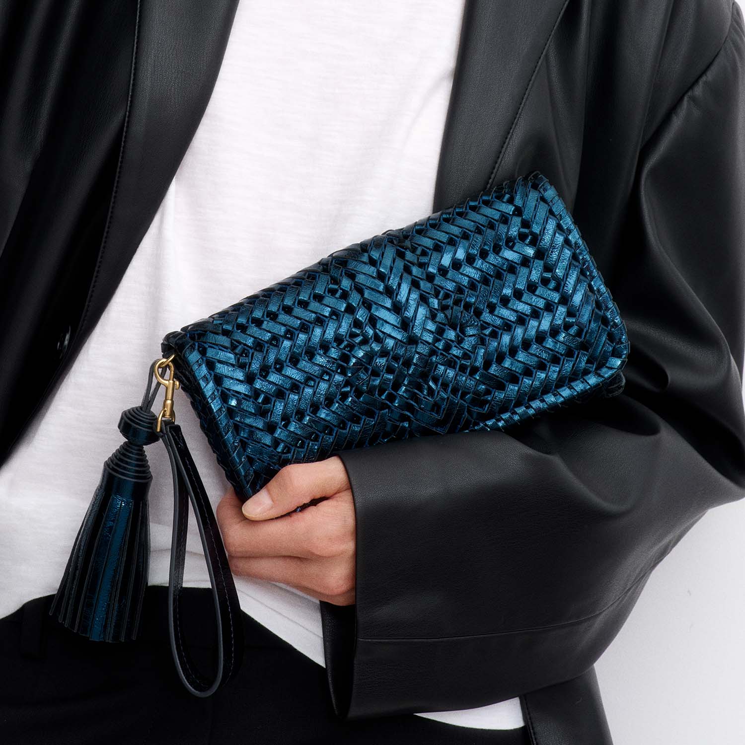 Neeson Tassel Clutch -

          
            Capra Leather in Metallic Blue -
          

          Anya Hindmarch EU
