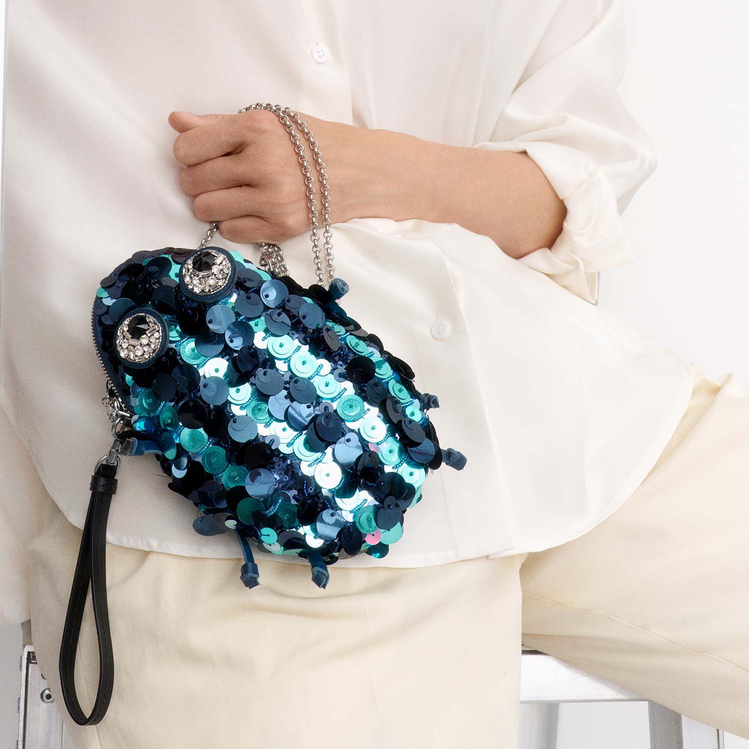 Embellished Bug Cross-body Pouch -

          
            Sequins in Petrol blue -
          

          Anya Hindmarch EU
