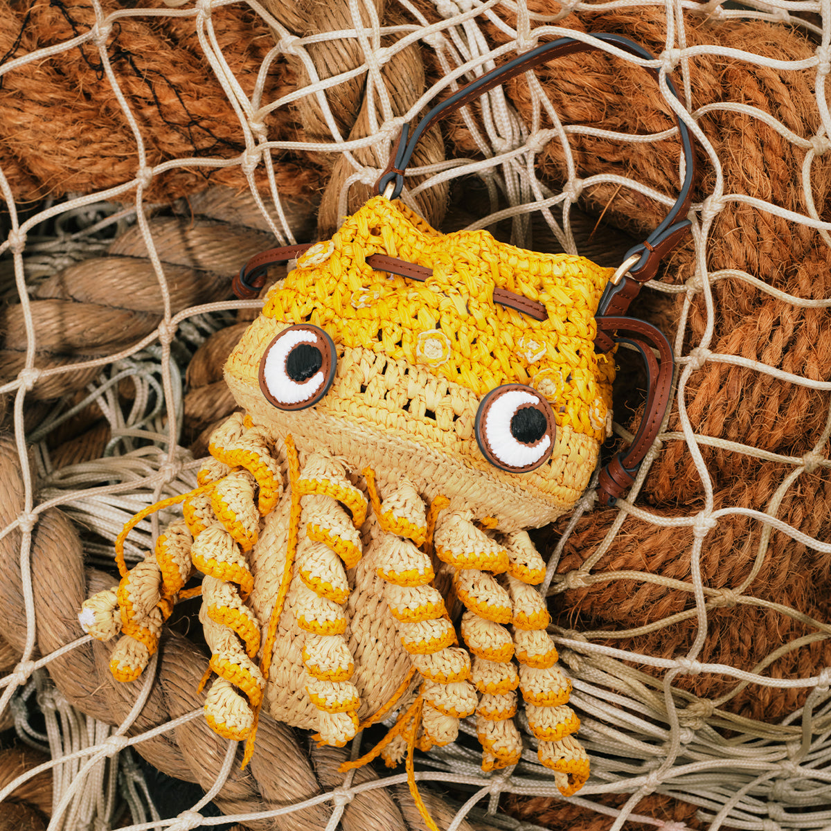 Raffia Jellyfish Cross-body -

          
            Raffia/Smooth Leather in Cumin Yellow  -
          

          Anya Hindmarch EU
