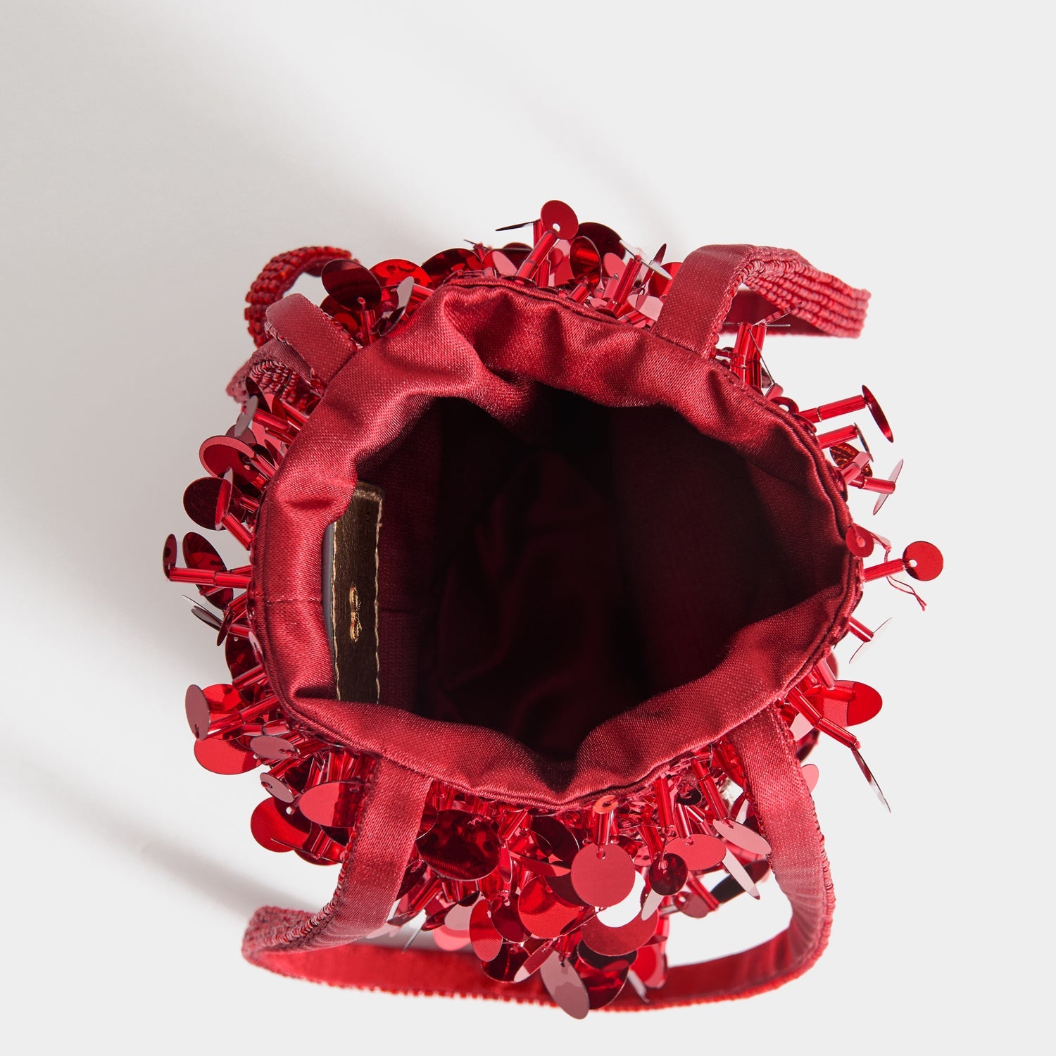 Anya Brands Imperial Leather Mini Bucket Bag -

          
            Satin/Sequins in Red -
          

          Anya Hindmarch EU
