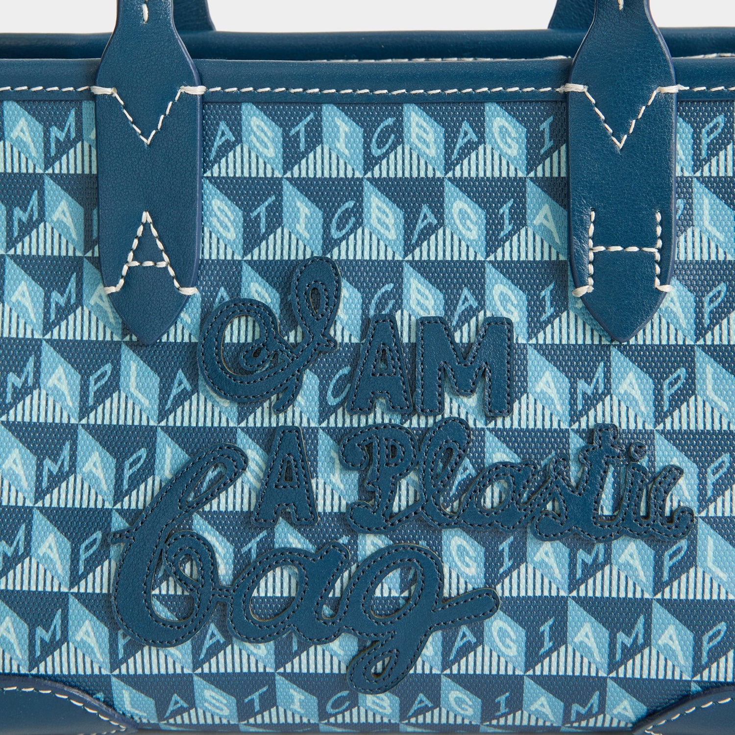 I Am A Plastic Bag Mini Tote -

          
            Recycled canvas/Satin leather in Petrol Blue -
          

          Anya Hindmarch EU
