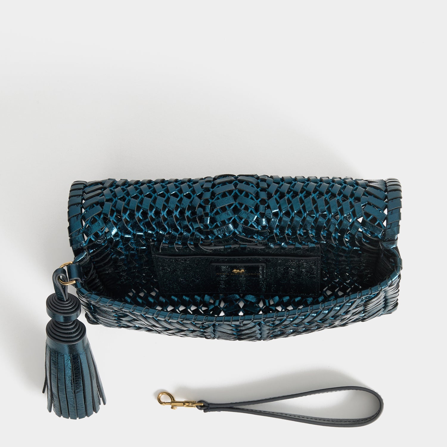 Neeson Tassel Clutch -

          
            Capra Leather in Metallic Blue -
          

          Anya Hindmarch EU
