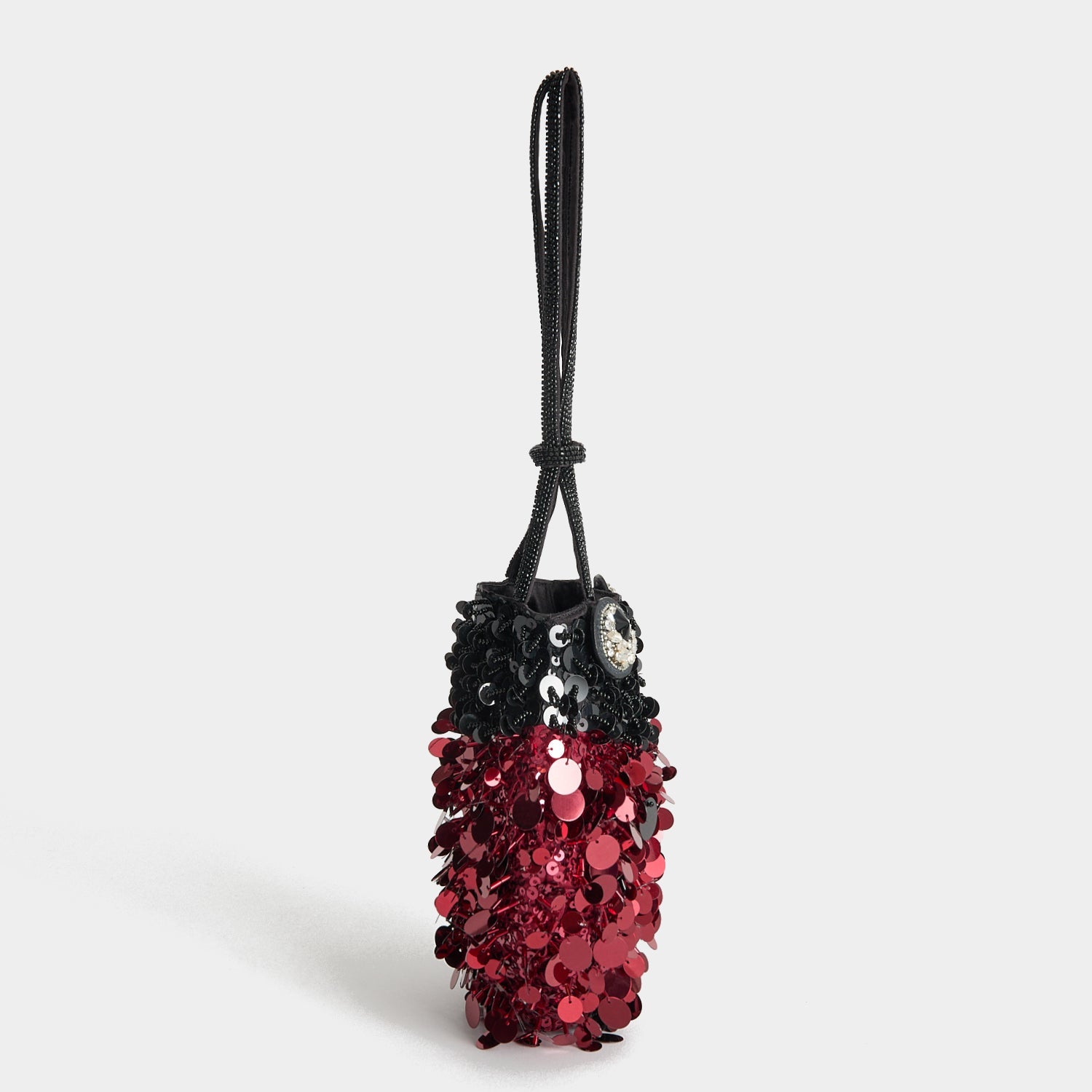 Ladybird Mini Bucket Bag -

          
            Sequins in black and red -
          

          Anya Hindmarch EU
