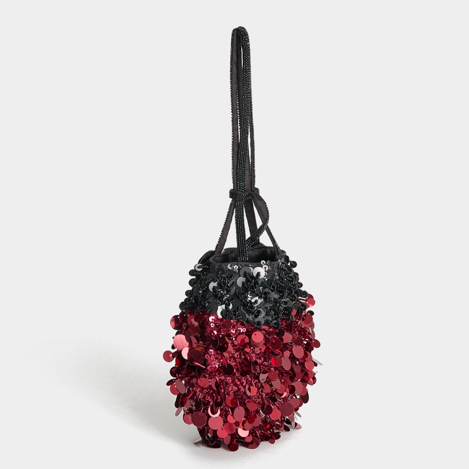 Ladybird Mini Bucket Bag -

          
            Sequins in black and red -
          

          Anya Hindmarch EU

