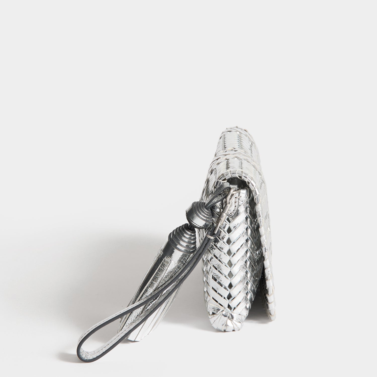 Neeson Tassel Clutch -

          
            Capra Leather in Silver -
          

          Anya Hindmarch EU
