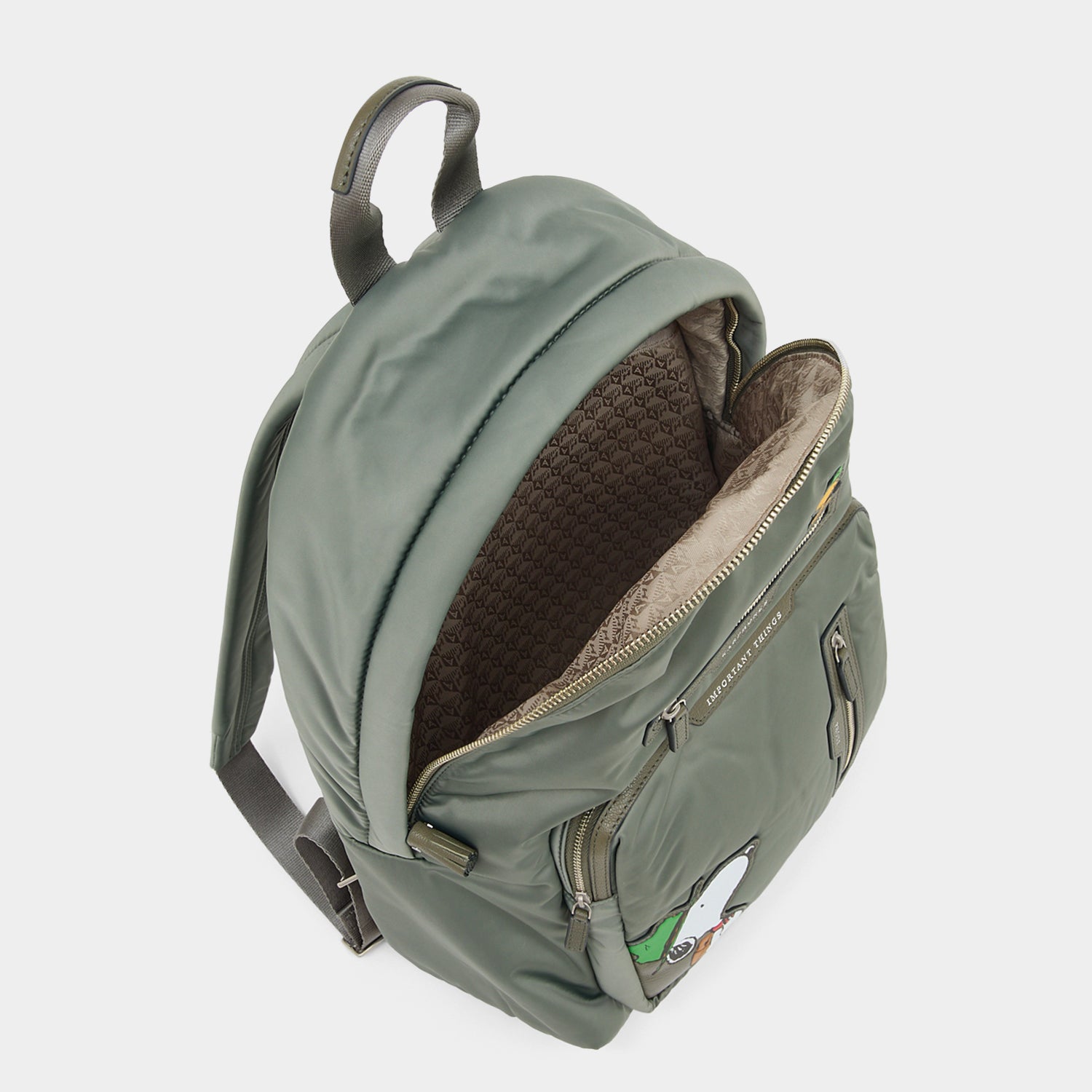Peanuts Snoopy Backpack -

          
            Recycled padded fabric in Fern Green -
          

          Anya Hindmarch EU
