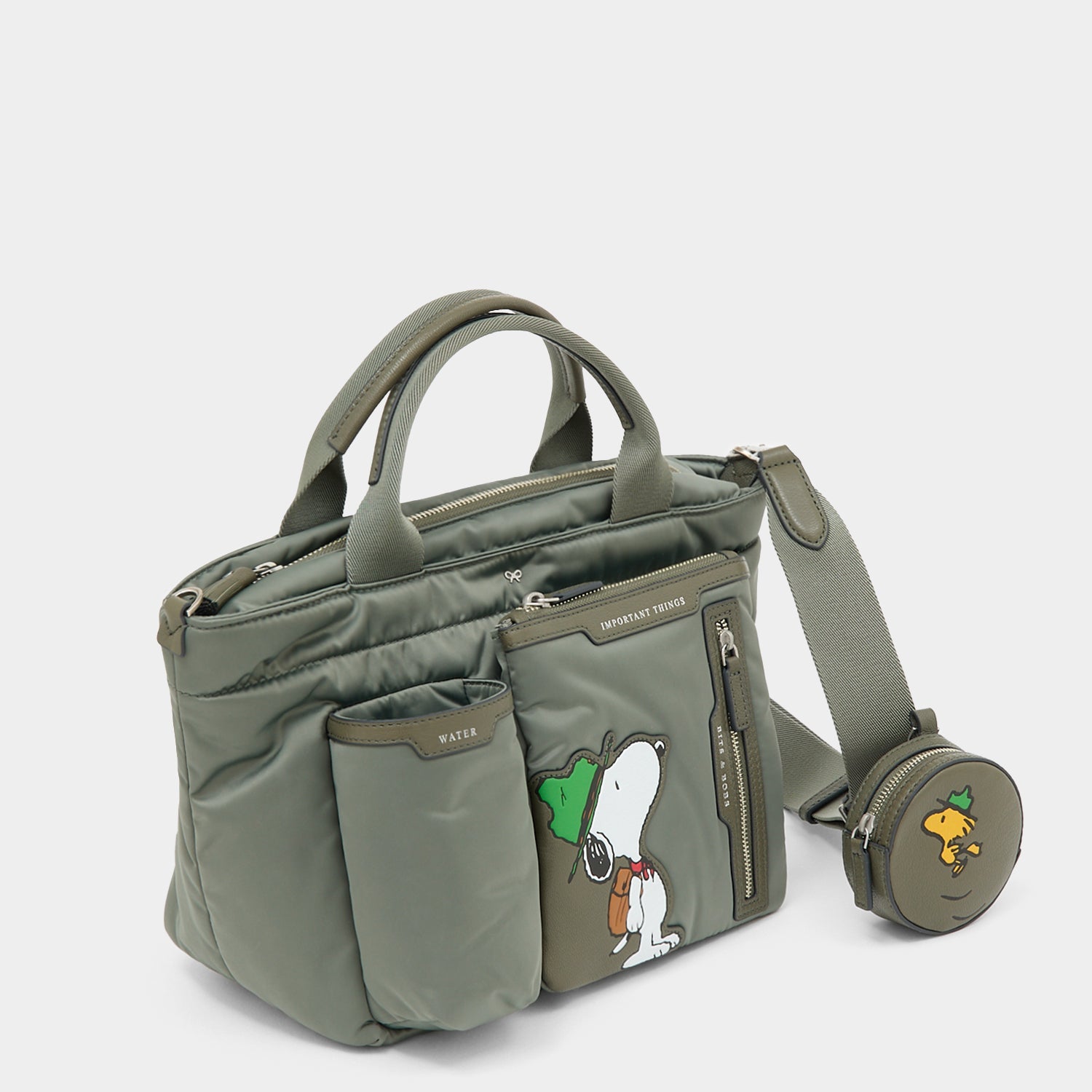 Peanuts Snoopy E/W Mini Tote -

          
            Recycled padded fabric in Fern Green -
          

          Anya Hindmarch EU
