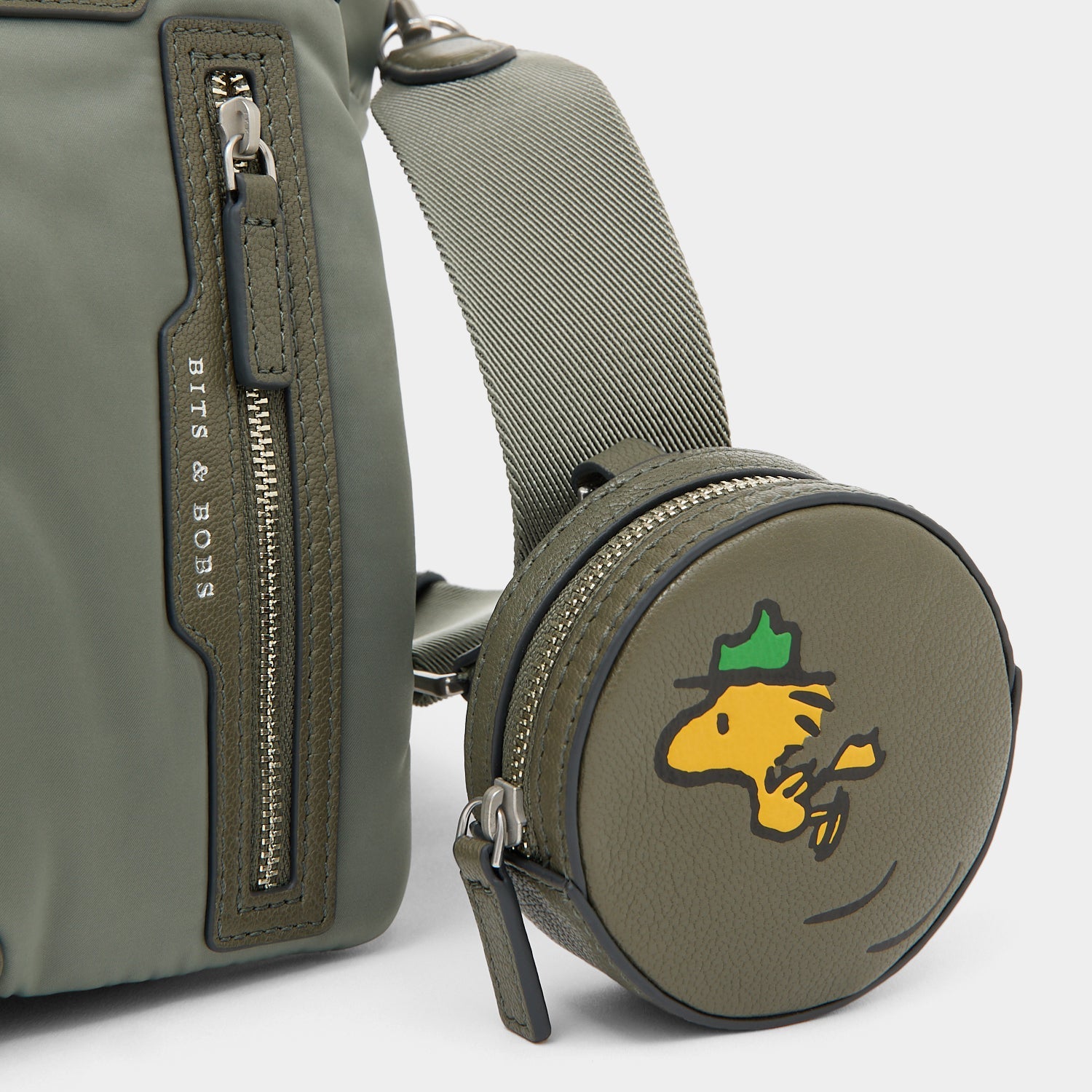 Peanuts Snoopy E/W Mini Tote -

          
            Recycled padded fabric in Fern Green -
          

          Anya Hindmarch EU
