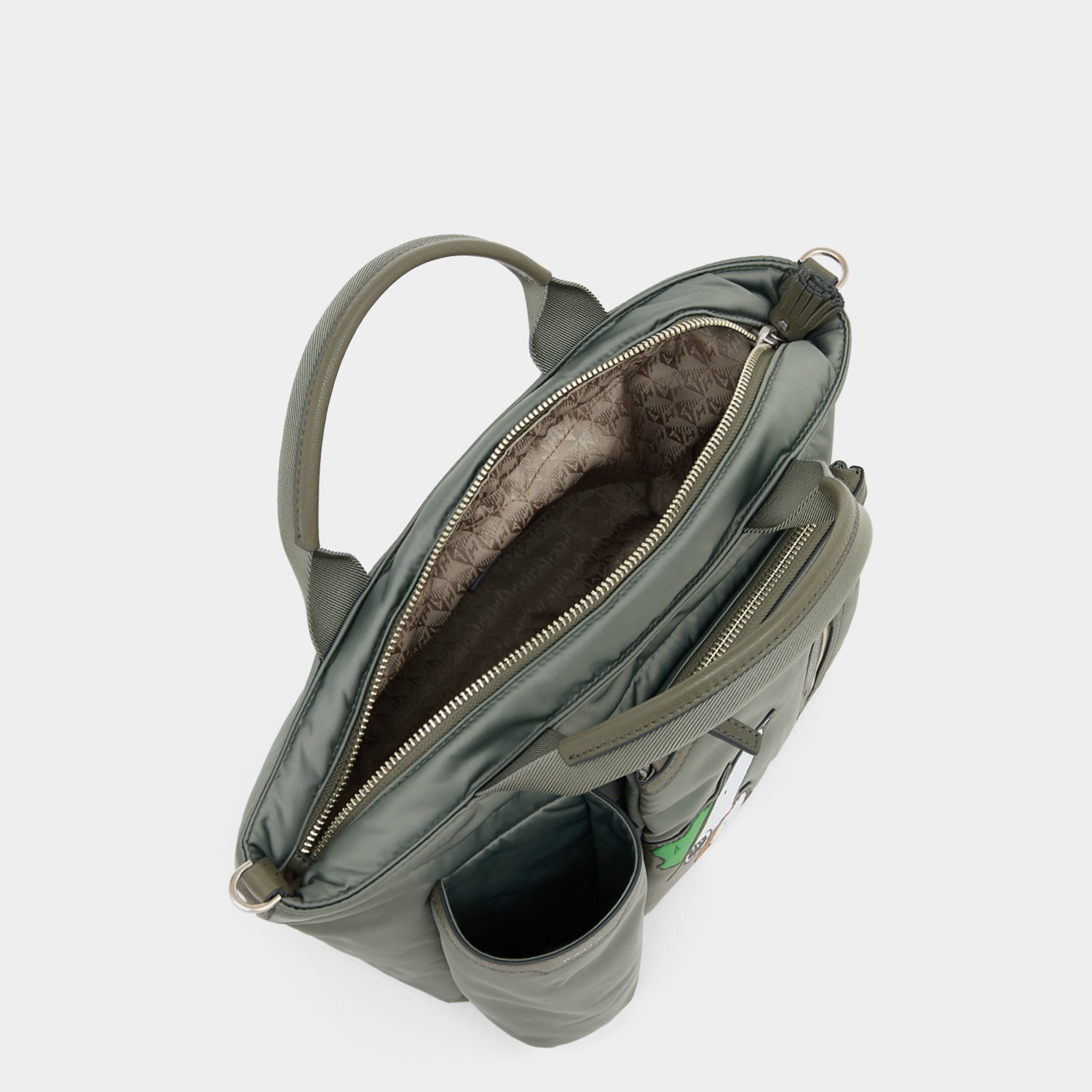 Peanuts Snoopy E/W Mini Tote -

          
            Recycled padded fabric in Fern Green -
          

          Anya Hindmarch EU
