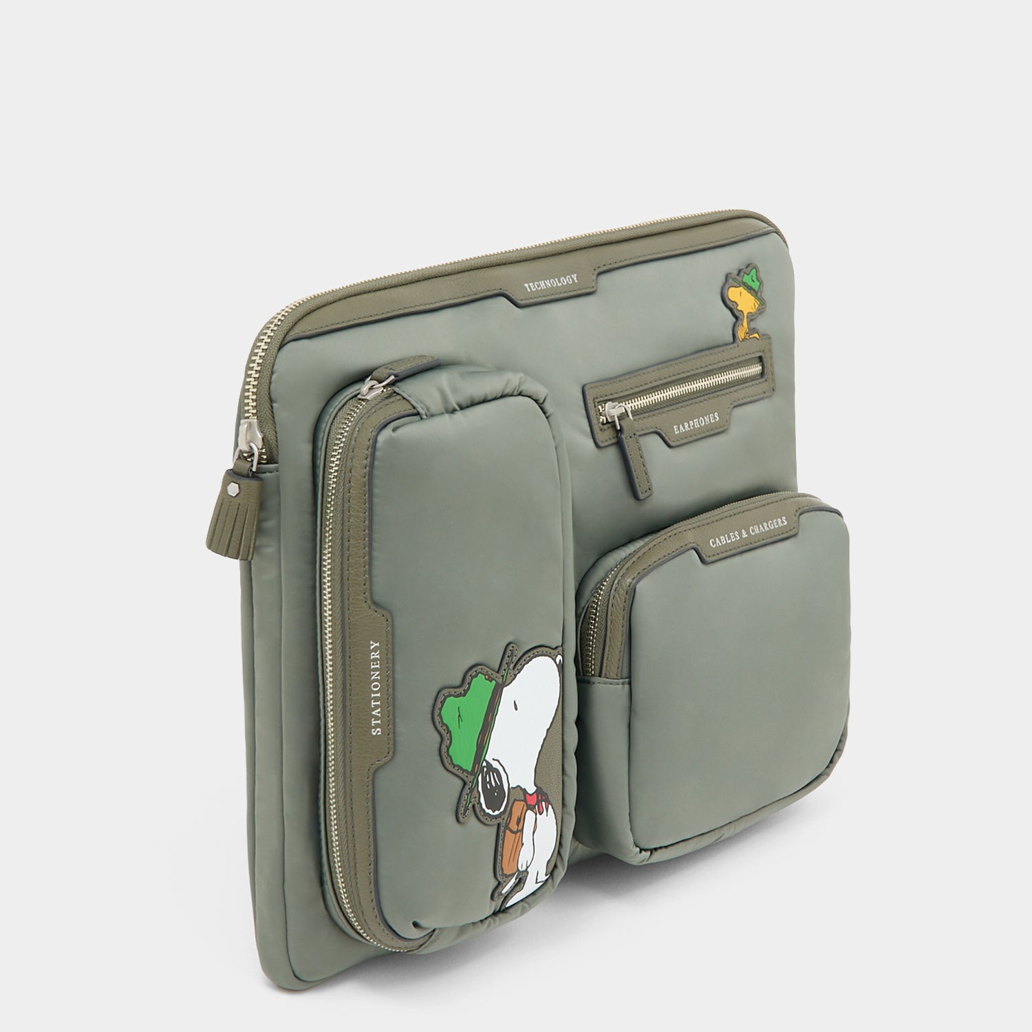 Peanuts Snoopy Tech Case -

          
            Recycled padded fabric in Fern Green -
          

          Anya Hindmarch EU
