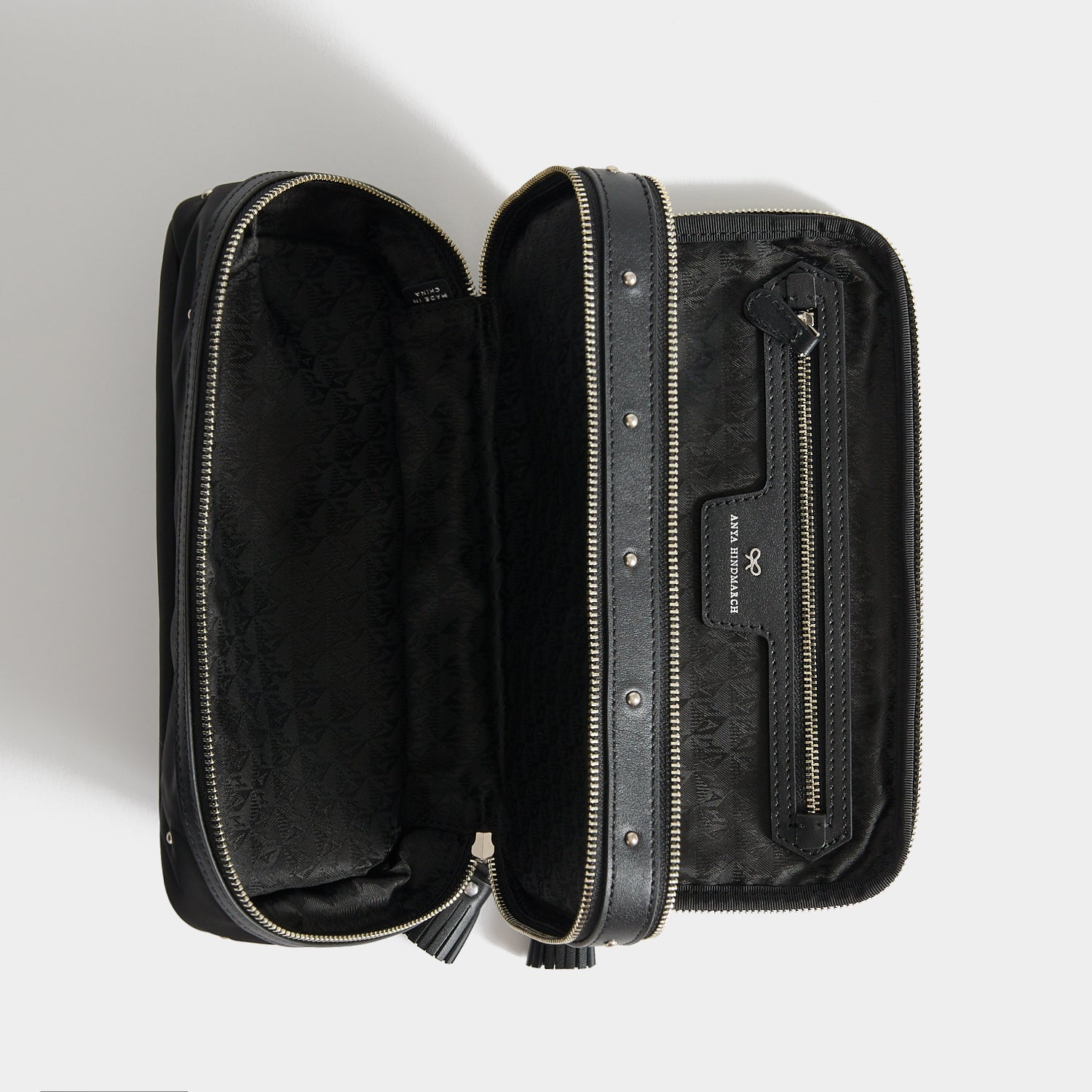 Studs Large Make-Up Pouch -

          
            Recycled Satin/Calf Leather in Black -
          

          Anya Hindmarch EU
