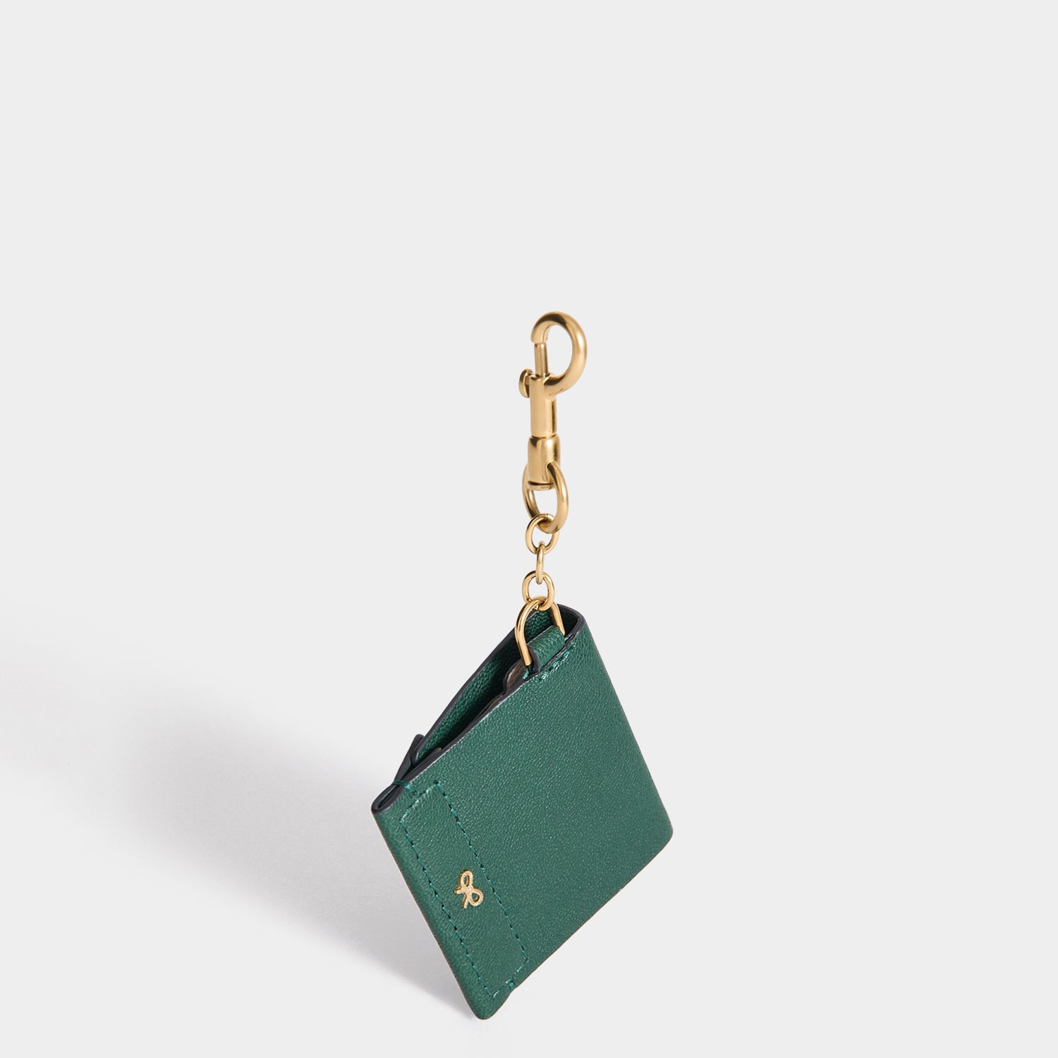 Christmas Charm -

          
            Capra Leather in Dark Green -
          

          Anya Hindmarch EU
