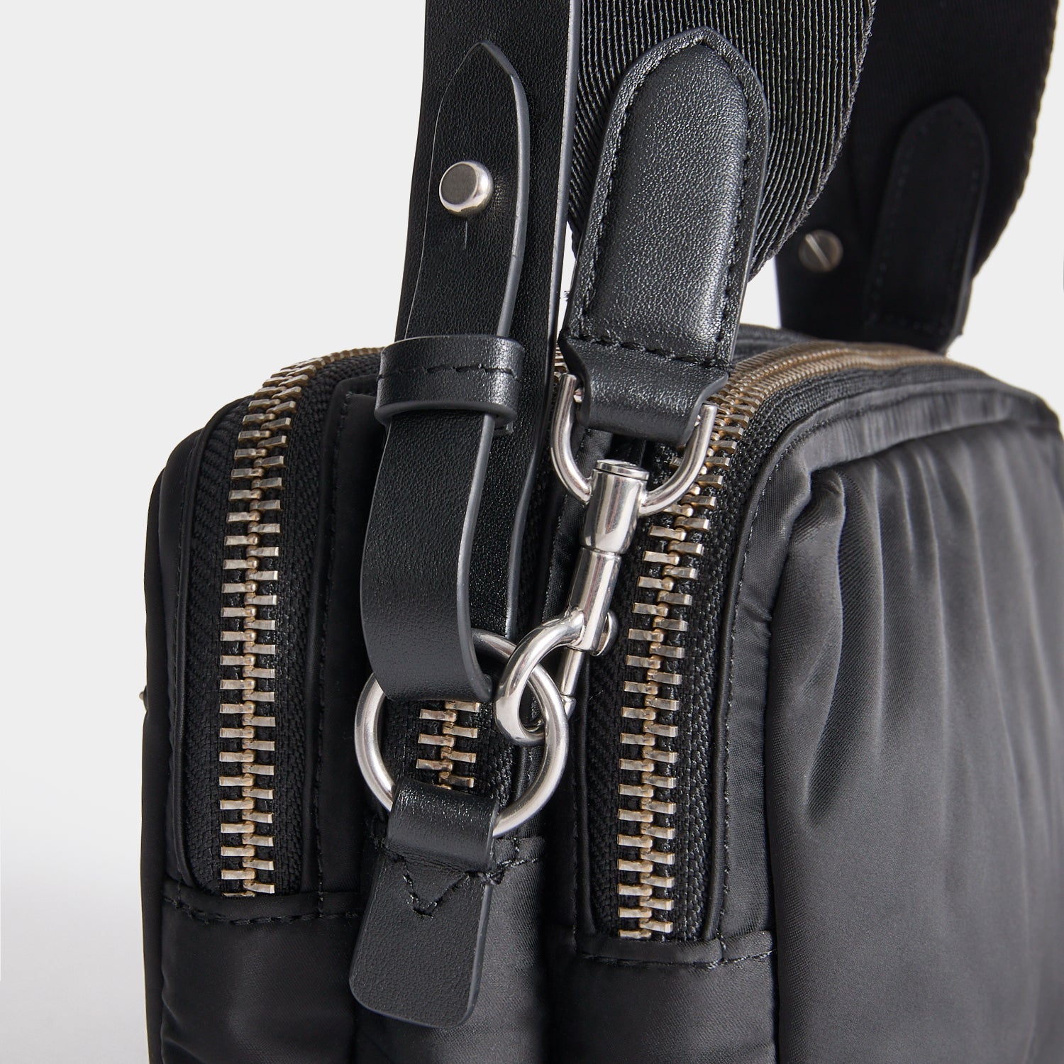 Studs Triple Zip Cross-body -

          
            Recycled Satin/Calf Leather in Black -
          

          Anya Hindmarch EU

