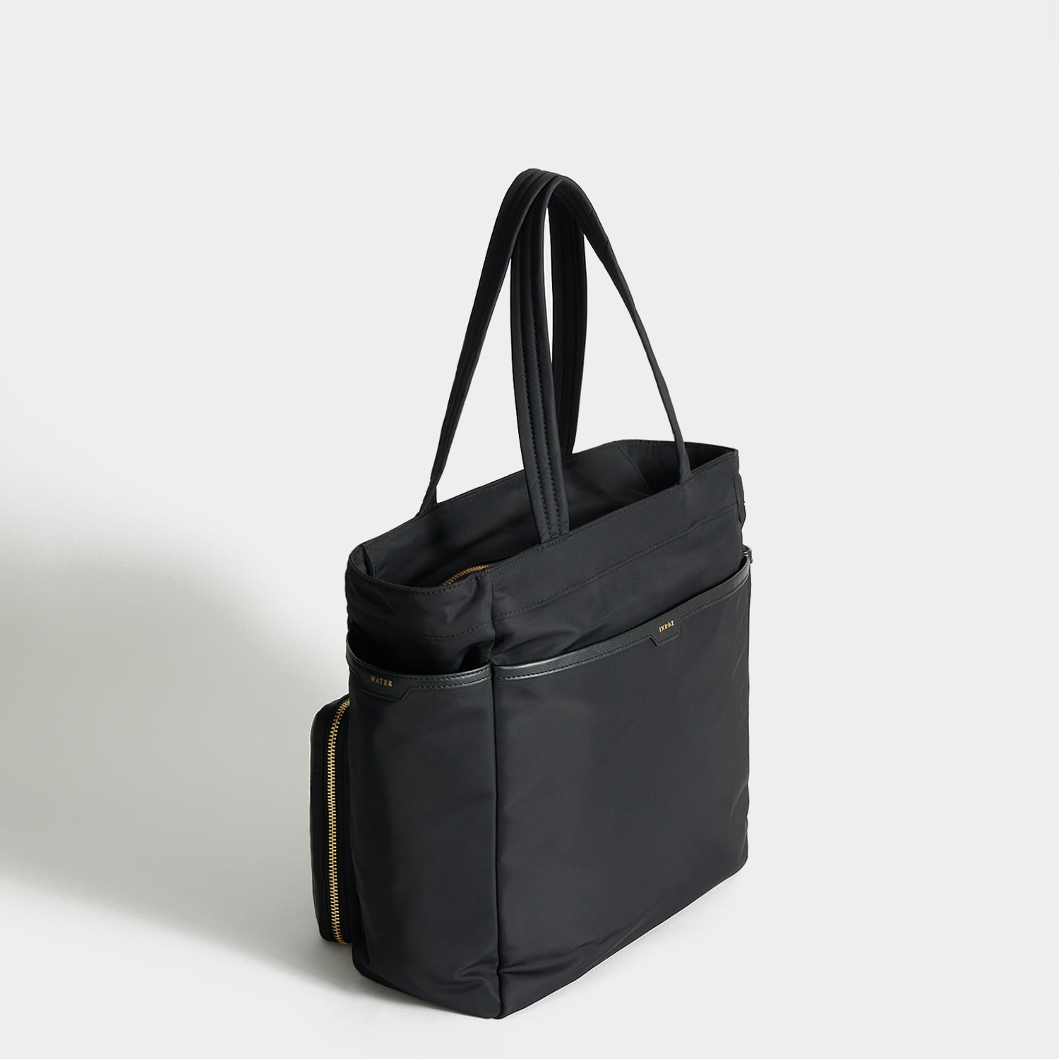 Commuter Tote -

          
            Regenerated Econyl® in Black -
          

          Anya Hindmarch EU
