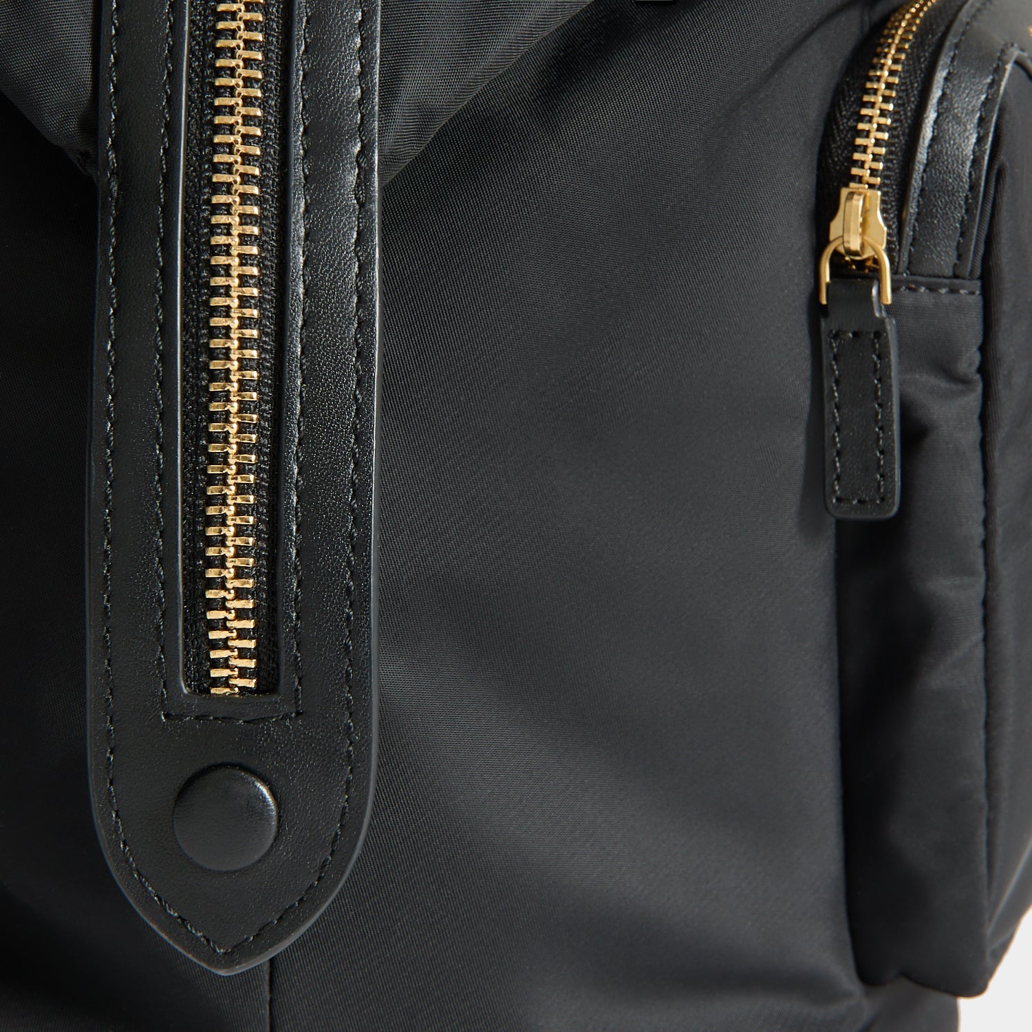 In-Flight Travel Bag -

          
            Regenerated Econyl® in Black -
          

          Anya Hindmarch EU
