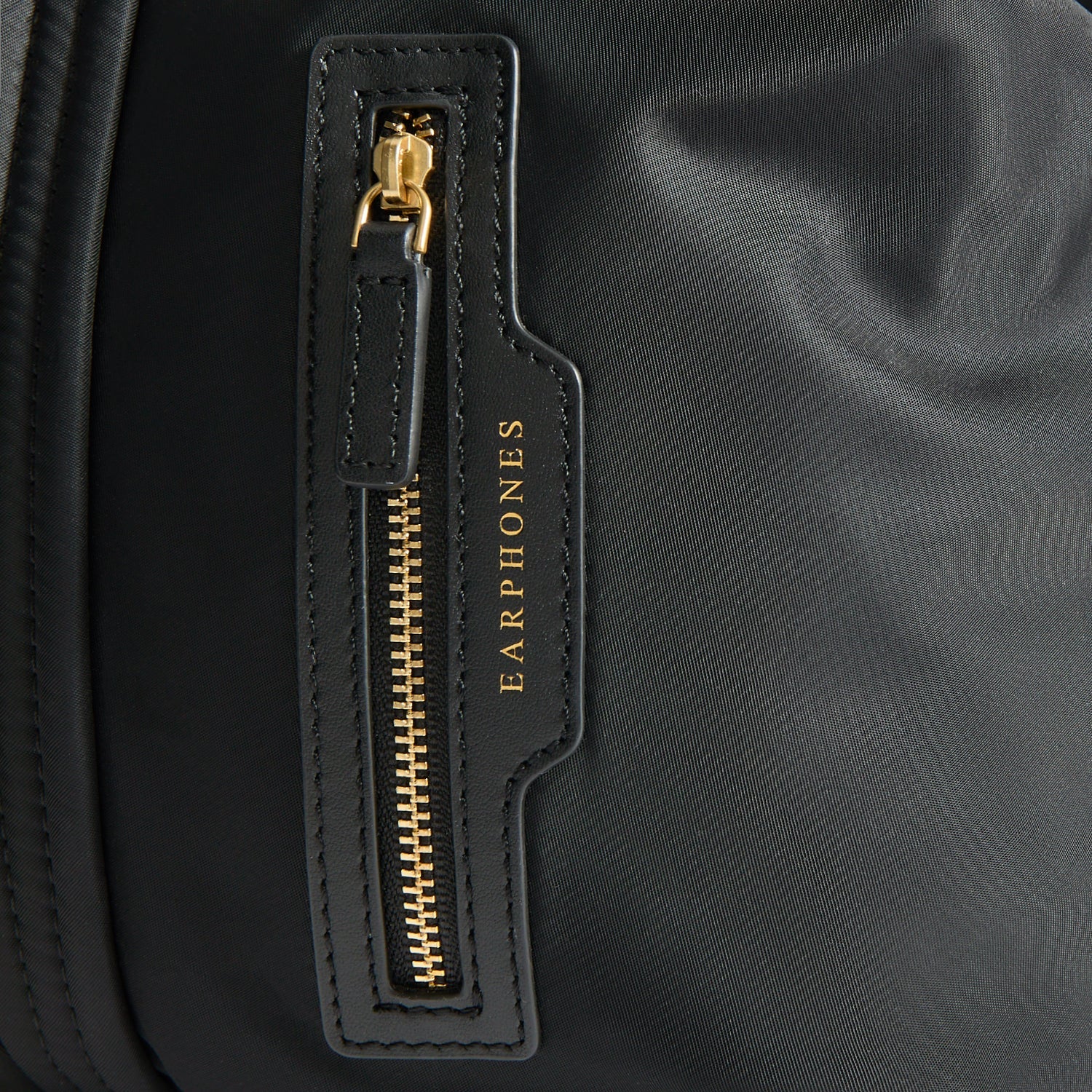 In-Flight Travel Bag -

          
            Regenerated Econyl® in Black -
          

          Anya Hindmarch EU
