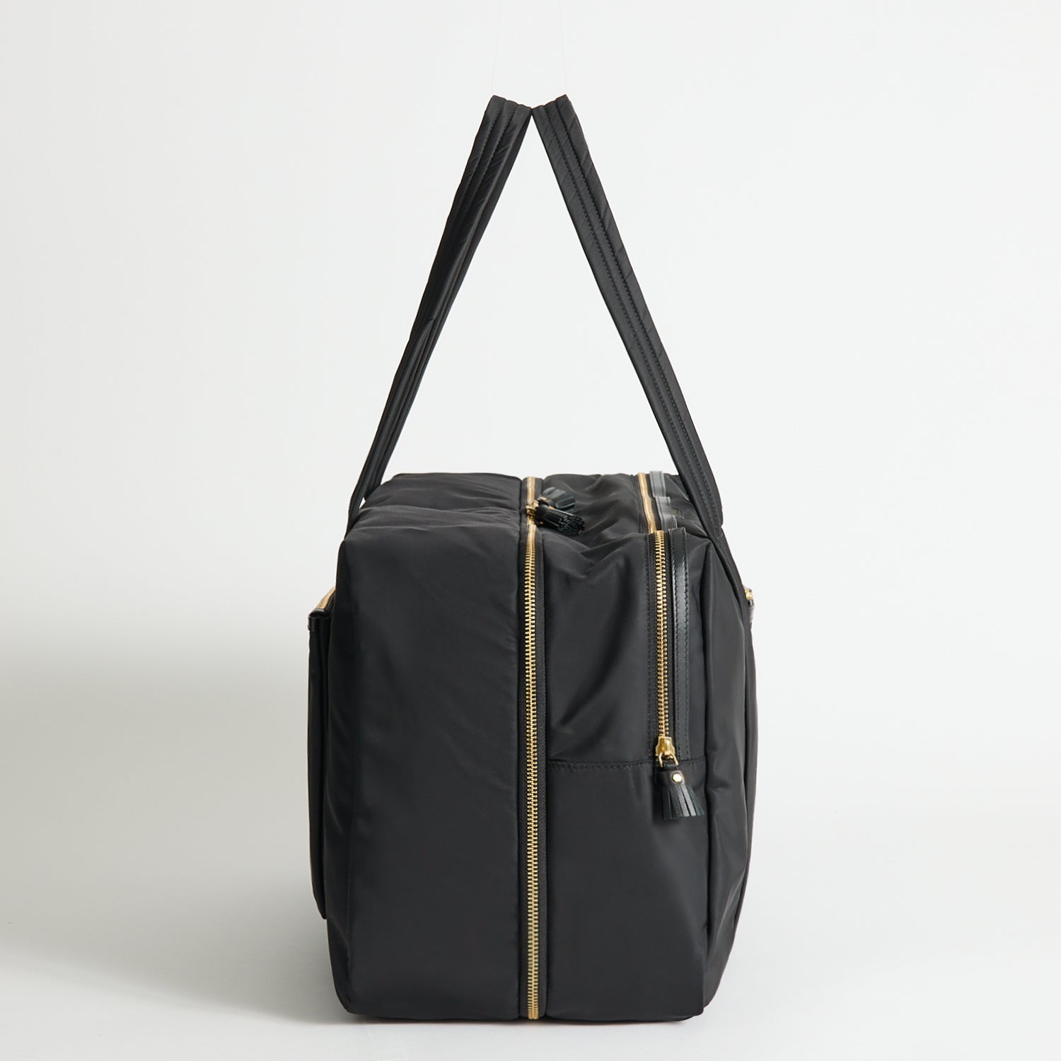 24 Hour Travel Bag -

          
            Regenerated ECONYL® in Black -
          

          Anya Hindmarch EU
