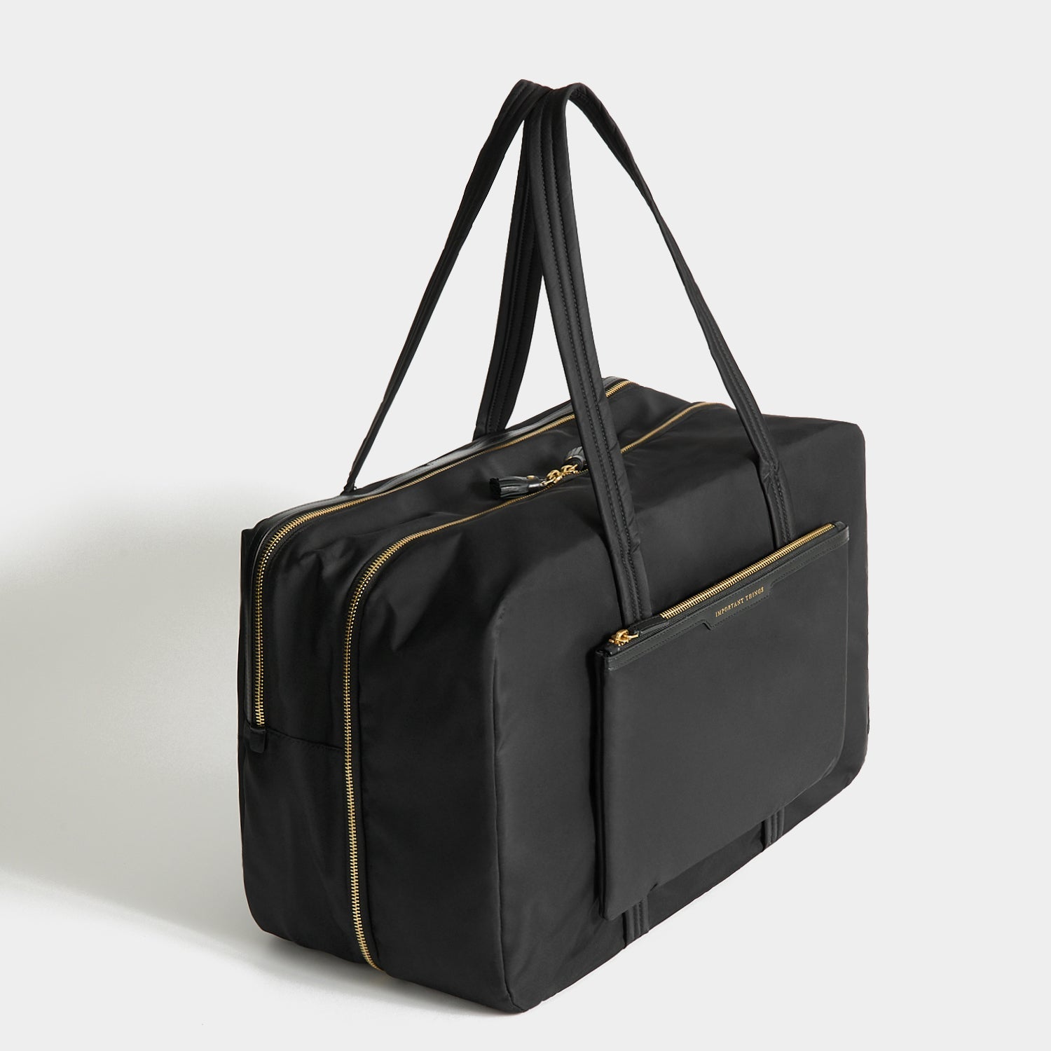 24 Hour Travel Bag -

          
            Regenerated ECONYL® in Black -
          

          Anya Hindmarch EU

