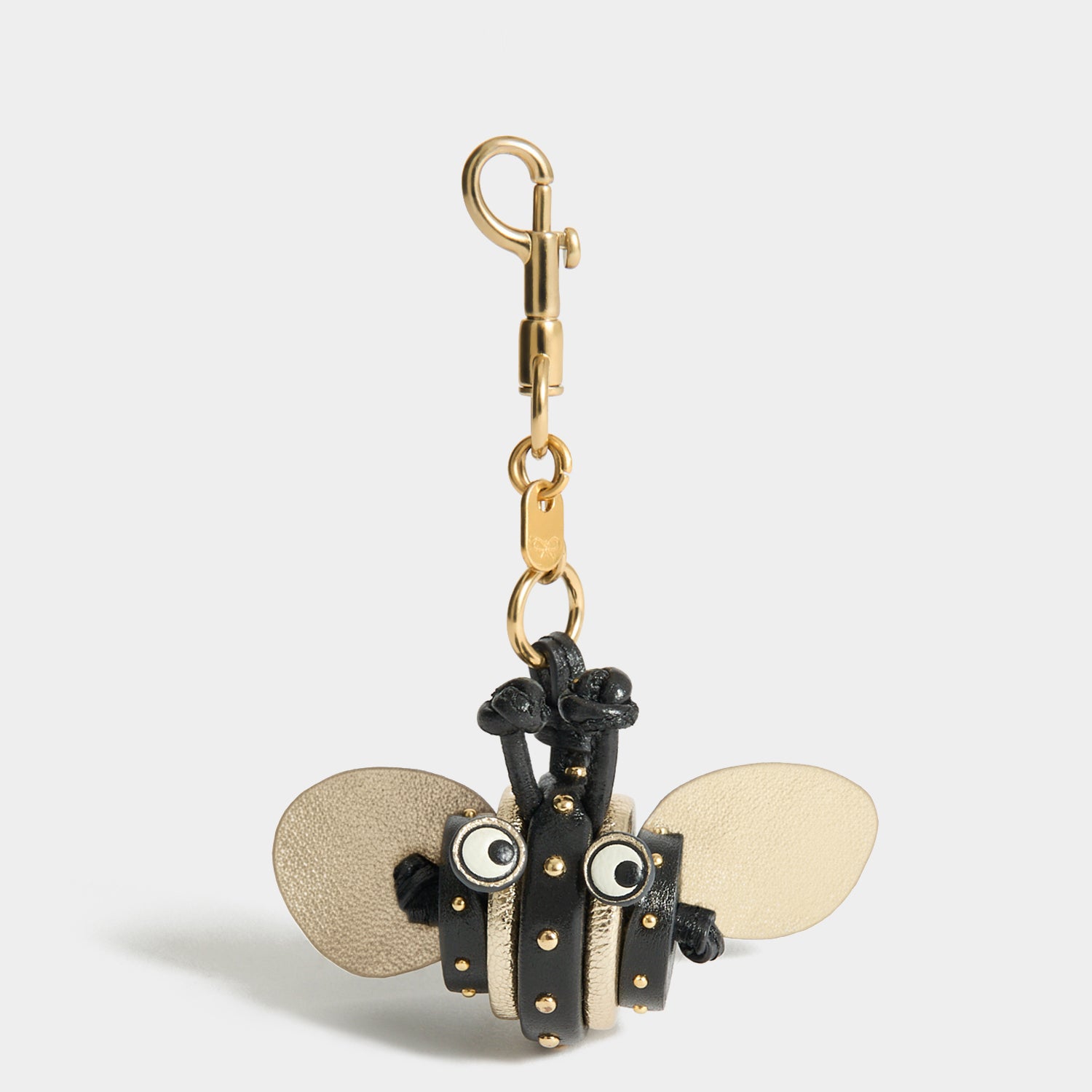 Bee Charm -

          
            Capra Leather in black -
          

          Anya Hindmarch EU
