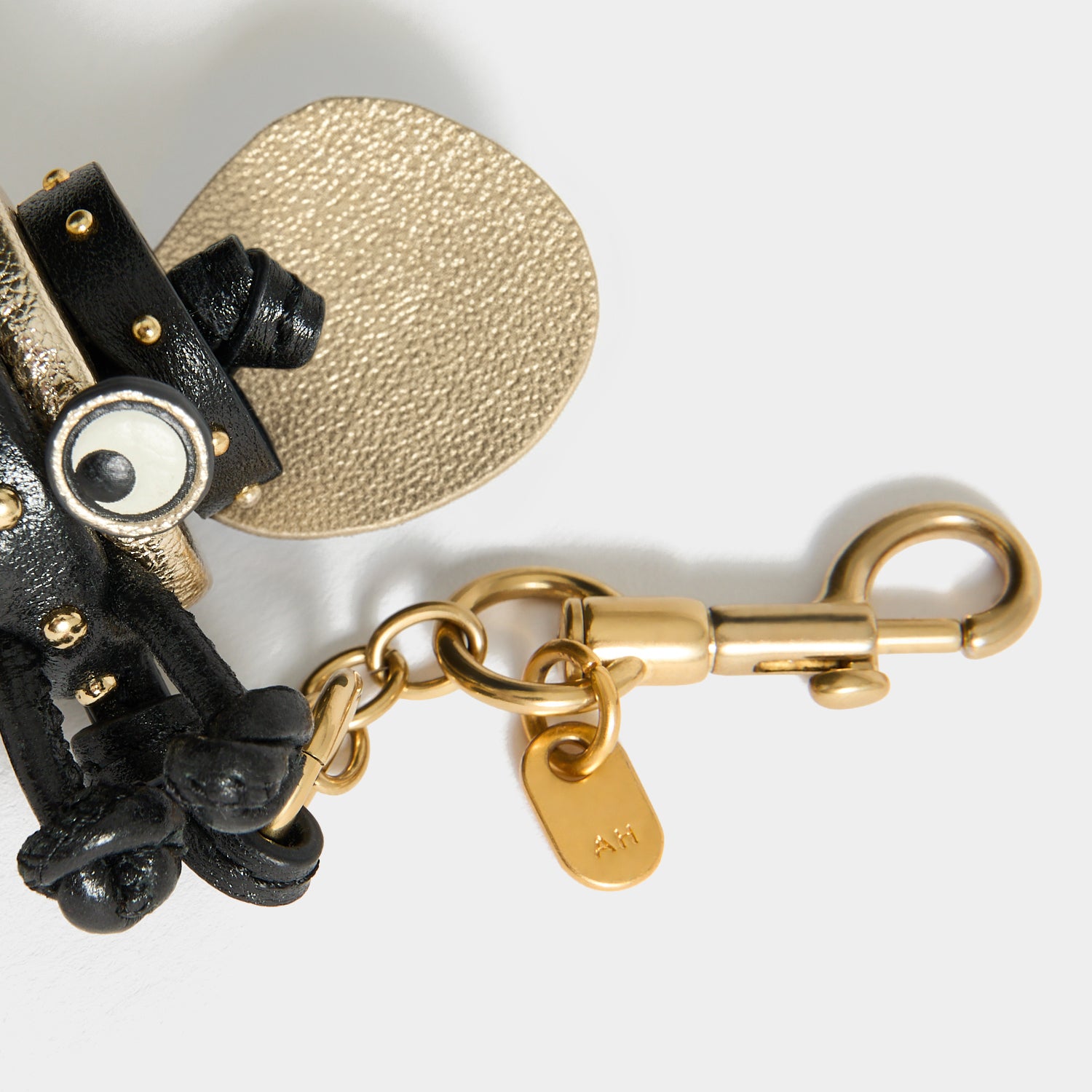 Bee Charm -

          
            Capra Leather in black -
          

          Anya Hindmarch EU
