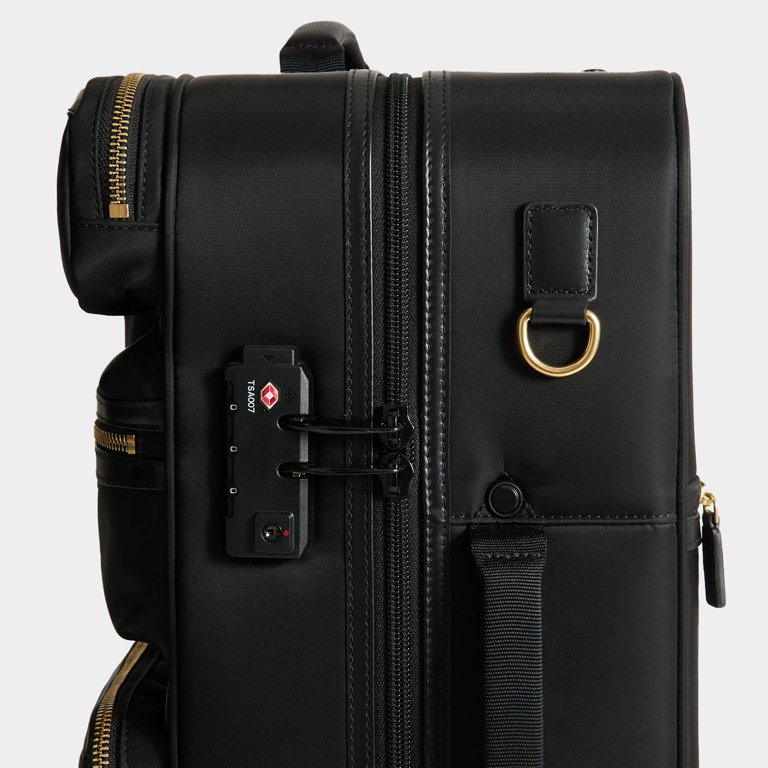 Short-Haul Suitcase -

          
            Econyl® Regenerated Nylon in Black -
          

          Anya Hindmarch EU
