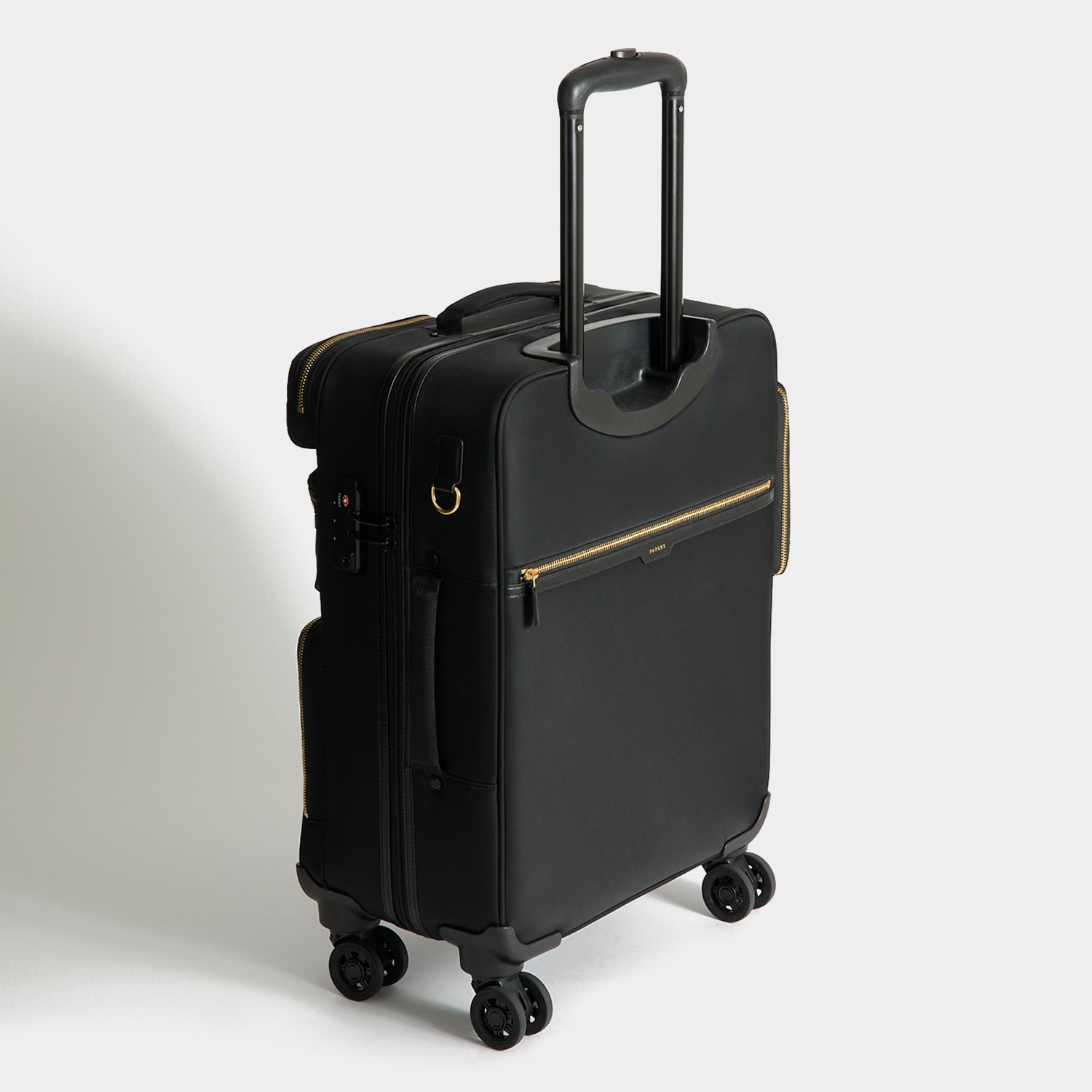 Short-Haul Suitcase -

          
            Econyl® Regenerated Nylon in Black -
          

          Anya Hindmarch EU

