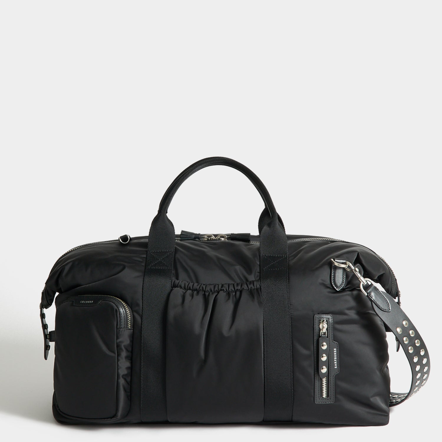 Studs In-Flight Maxi Travel Bag -

          
            Recycled Satin/Calf Leather in Black -
          

          Anya Hindmarch EU

