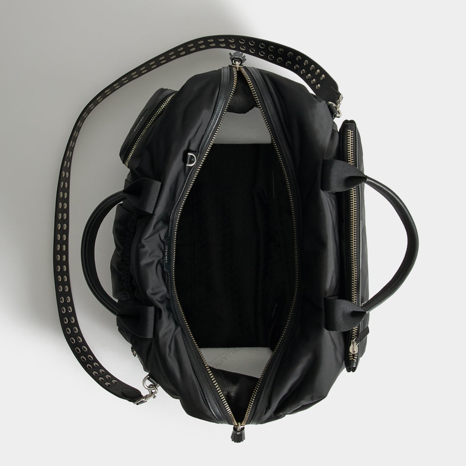 Studs In-Flight Maxi Travel Bag -

          
            Recycled Satin/Calf Leather in Black -
          

          Anya Hindmarch EU
