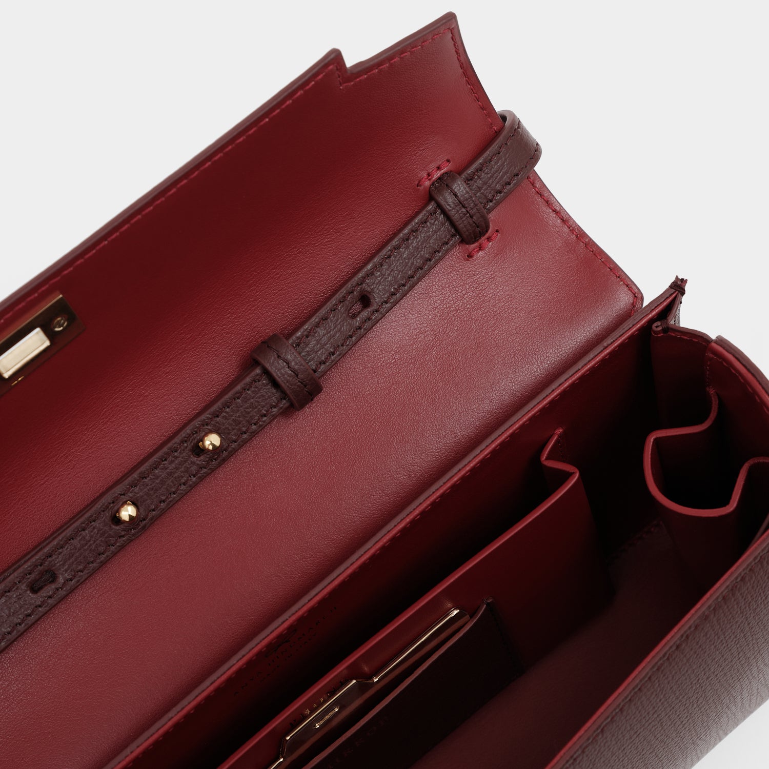 Mortimer Clutch -

          
            Crosshatch Leather in Barolo Red  -
          

          Anya Hindmarch EU
