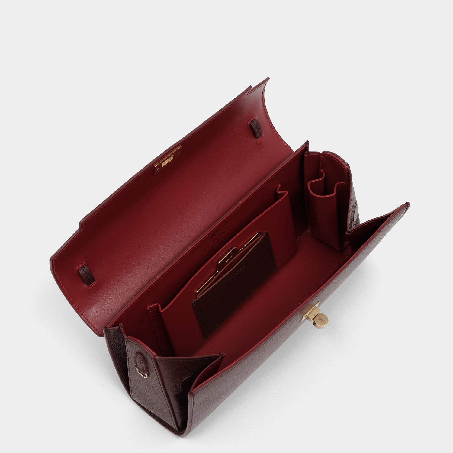 Mortimer Clutch -

          
            Crosshatch Leather in Barolo Red  -
          

          Anya Hindmarch EU
