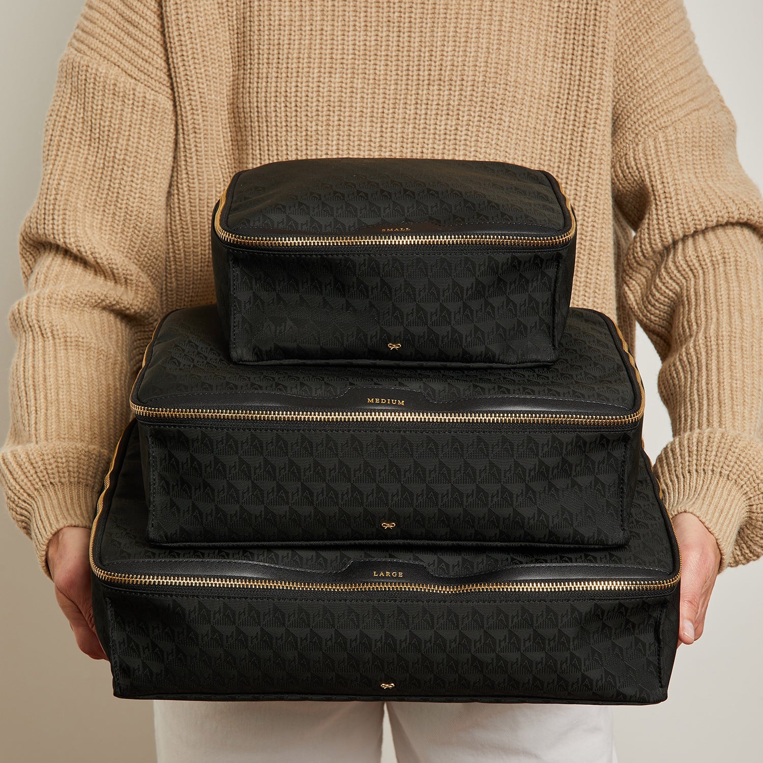Logo Small Packing Cube -

          
            Recycled Nylon in Black -
          

          Anya Hindmarch EU
