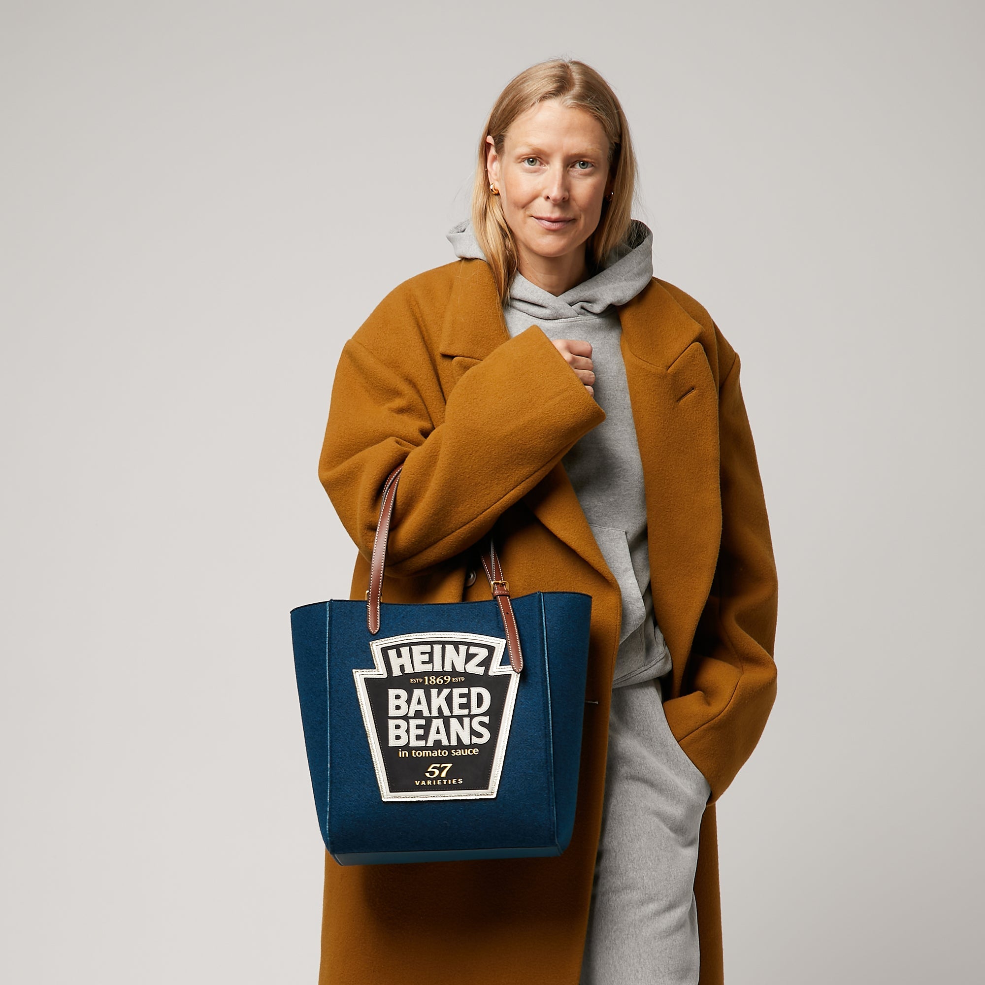 Anya Brands Heinz Baked Beans Small Tote -

                  
                    Recycled Felt in Teal -
                  

                  Anya Hindmarch EU
