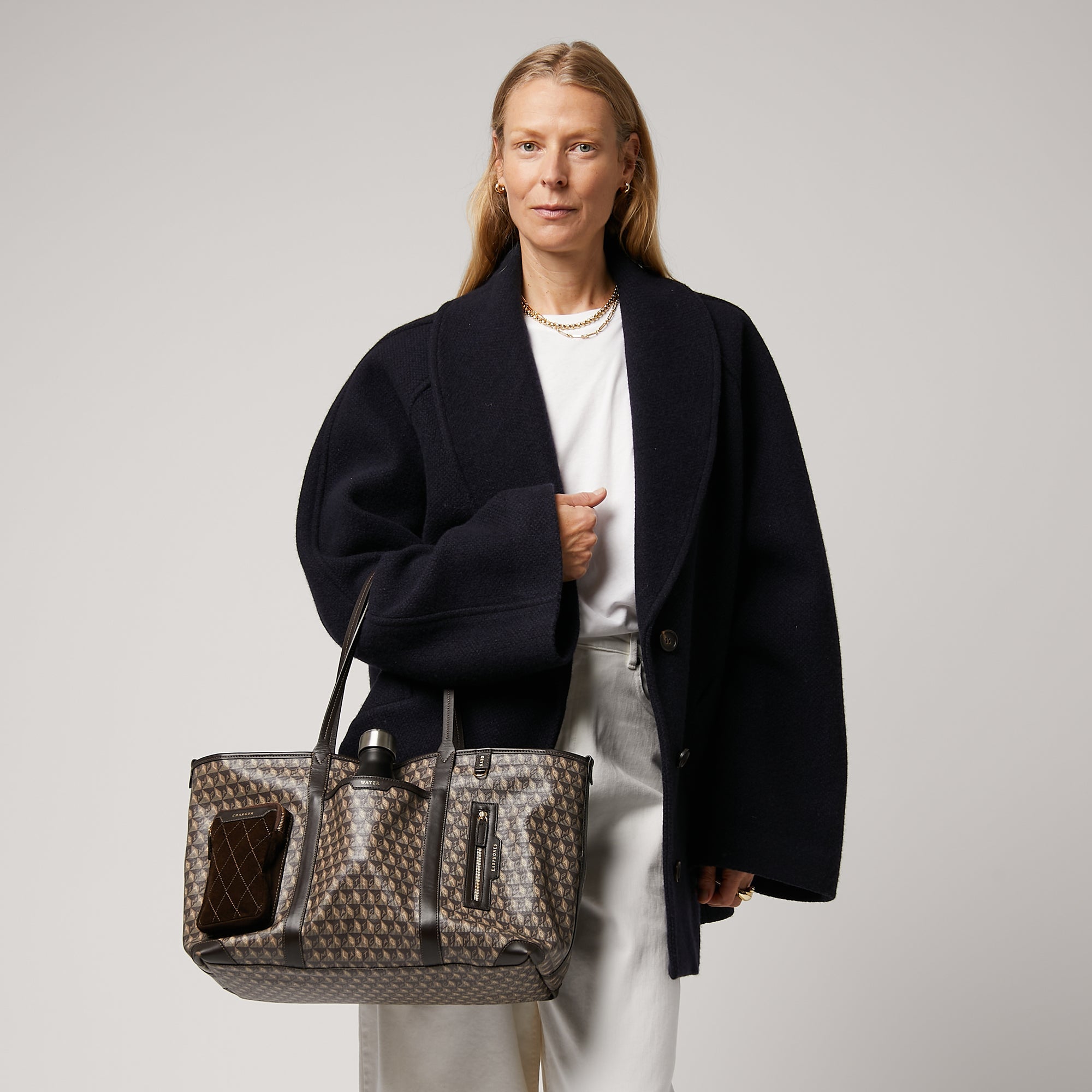I Am A Plastic Bag In-Flight Tote -

                  
                    Recycled Canvas in Truffle -
                  

                  Anya Hindmarch EU
