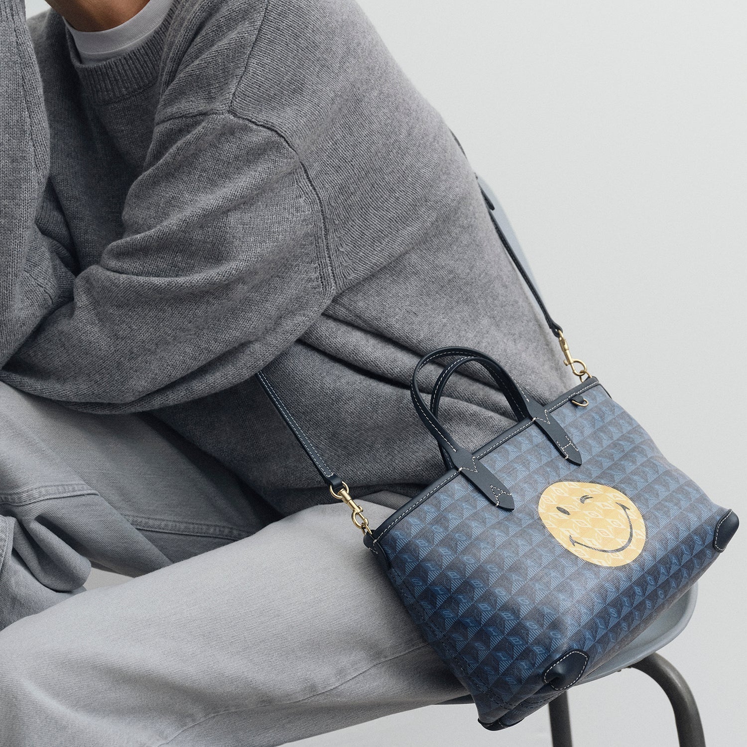 I am a Plastic Bag XS Wink Zipped Cross-body Tote -

          
            Recyled Canvas in Marine -
          

          Anya Hindmarch EU
