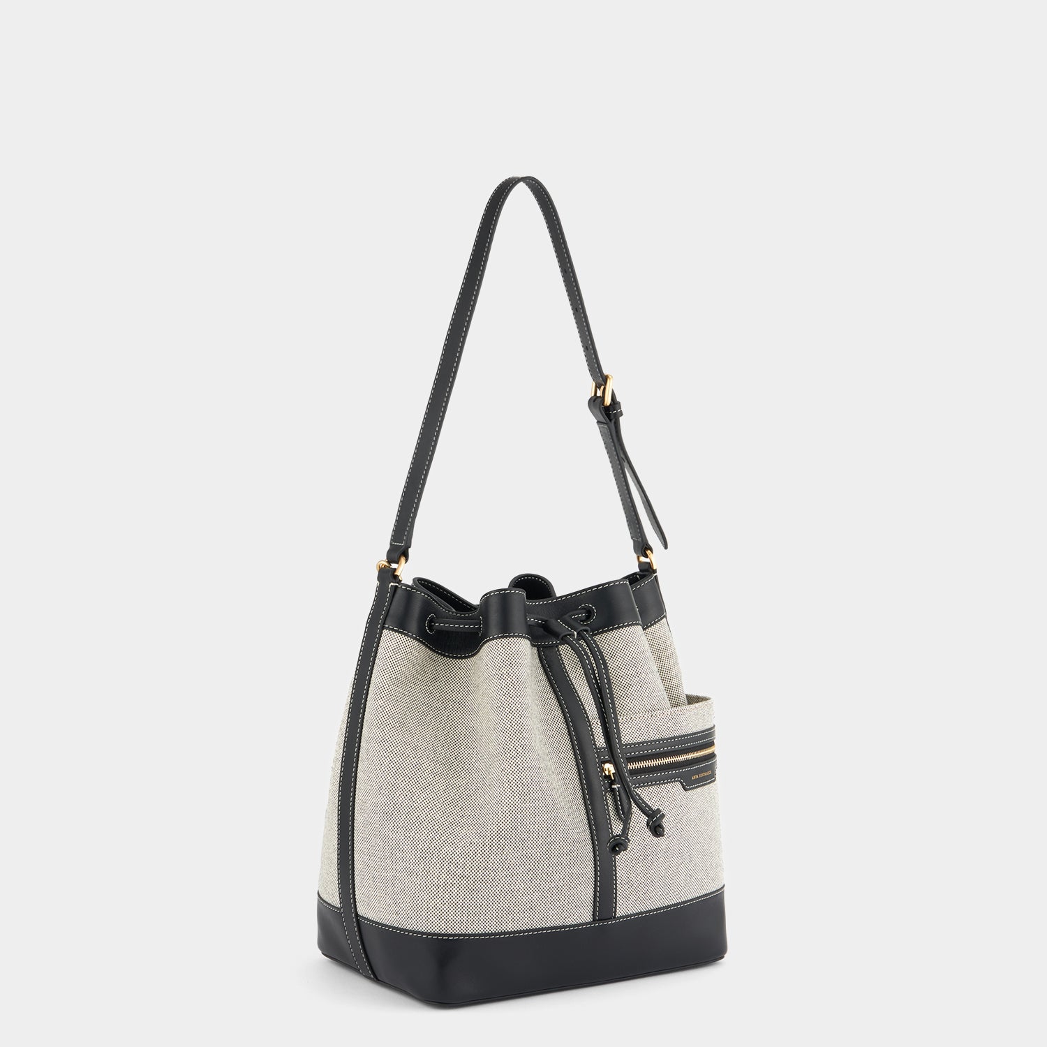 Pocket Bucket Bag -

          
            Canvas in Salt and Pepper -
          

          Anya Hindmarch EU
