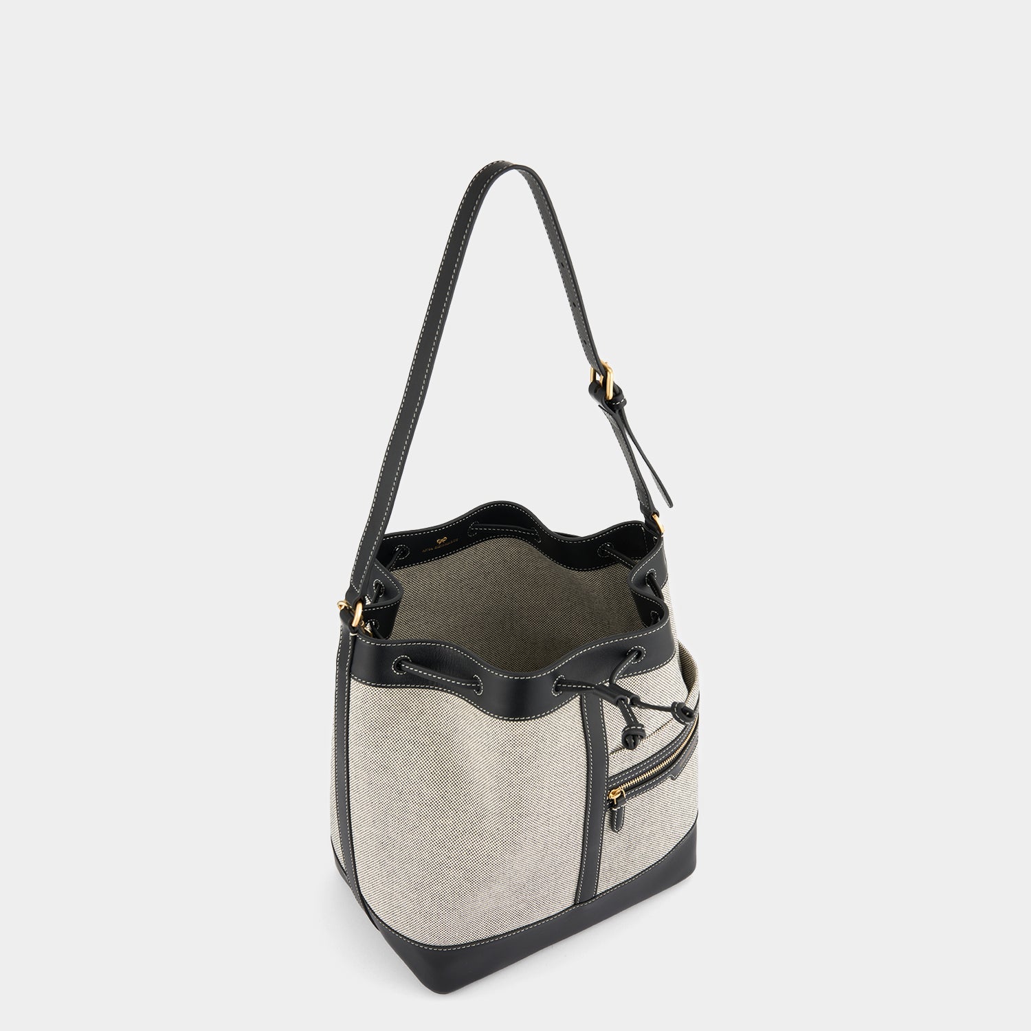 Pocket Bucket Bag -

          
            Canvas in Salt and Pepper -
          

          Anya Hindmarch EU
