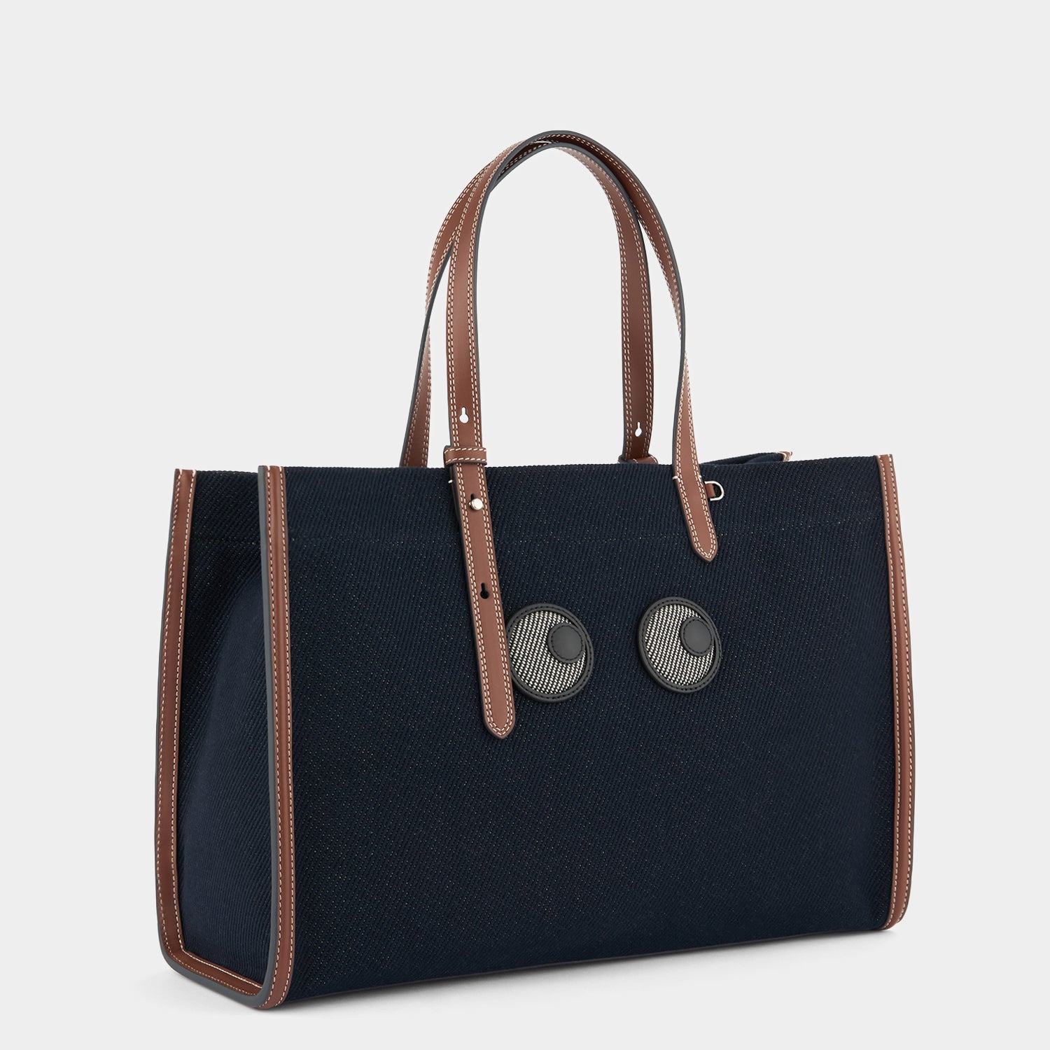 E/W Eyes Tote -

          
            Cotton Drill in Navy -
          

          Anya Hindmarch EU
