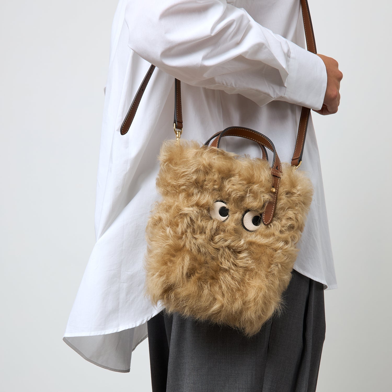 N/S Mini Eyes Shearling Tote -

          
            Shearling/Smooth Leather in Taupe -
          

          Anya Hindmarch EU
