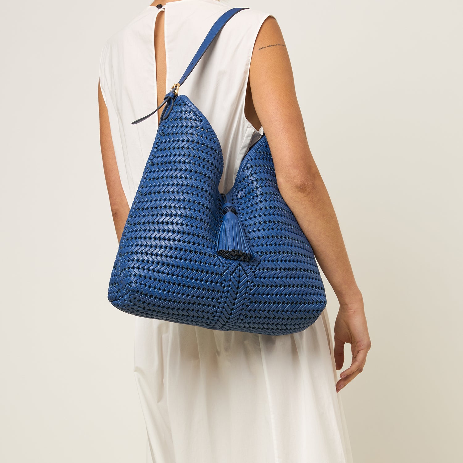 Neeson Tassel Hobo Bag -

          
            Capra Leather in Monday Blue -
          

          Anya Hindmarch EU
