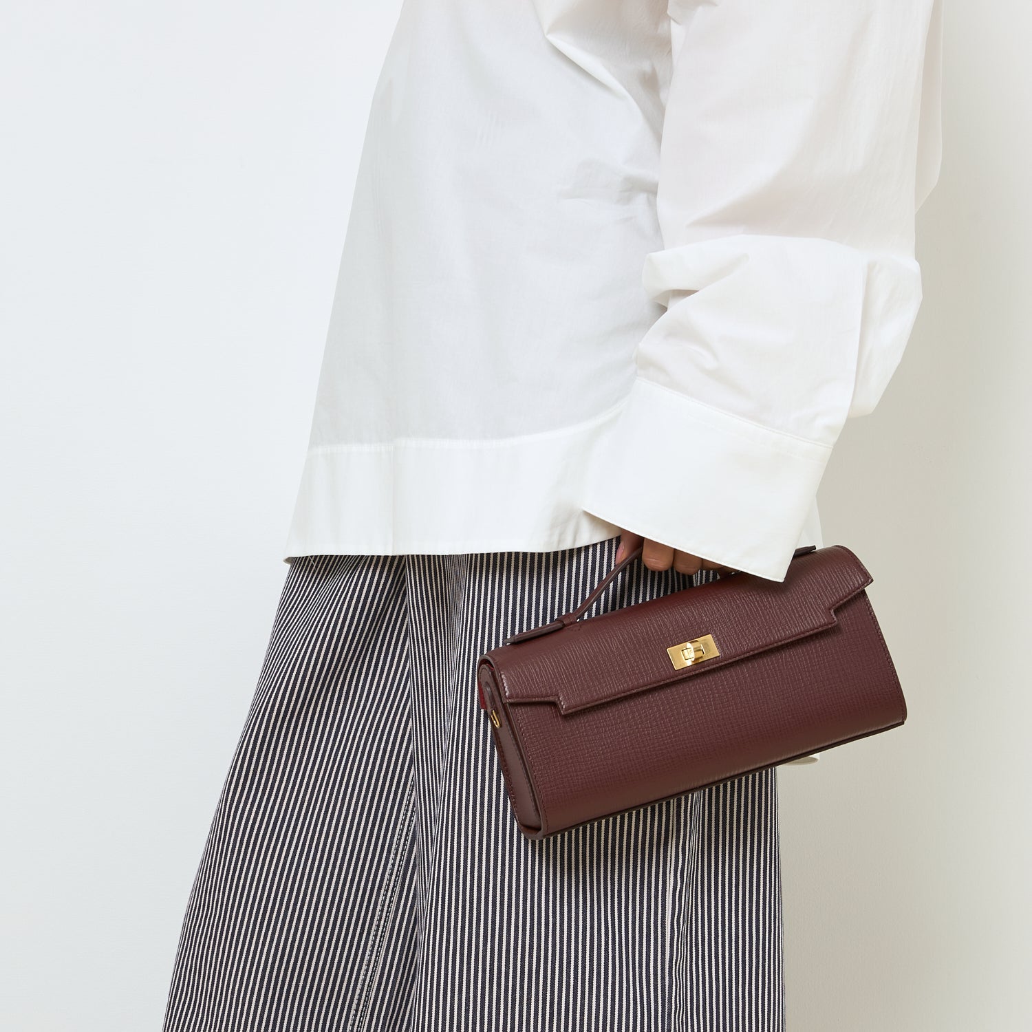 Mortimer Clutch -

          
            Crosshatch Leather in Barolo Red  -
          

          Anya Hindmarch EU
