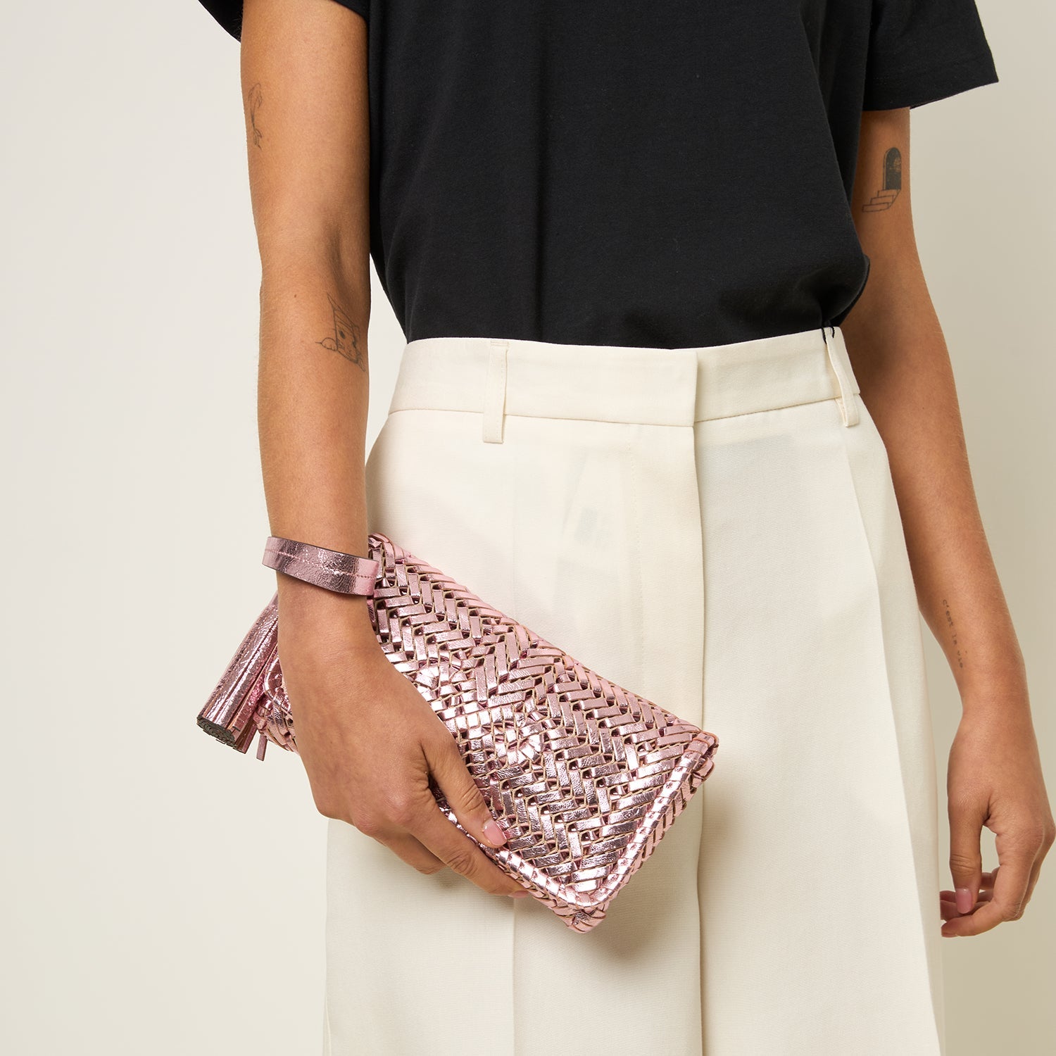 Neeson Tassel Clutch -

          
            Capra Leather in Peony Pink -
          

          Anya Hindmarch EU
