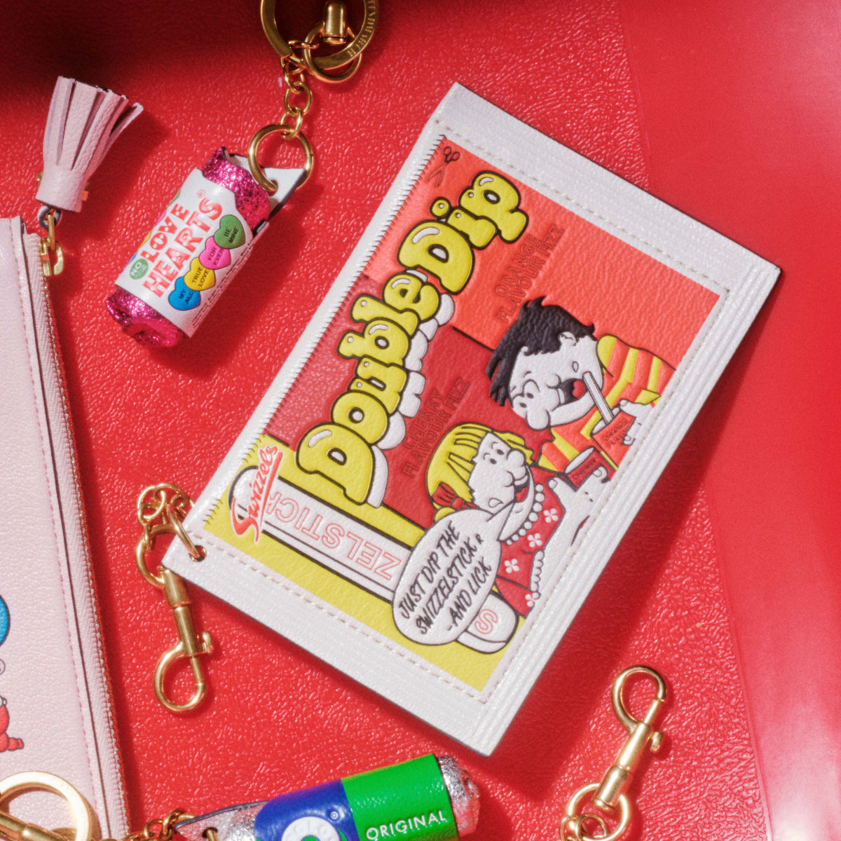 Anya Brands Double Dip Charm Earphone Case -

          
            Calf Leather in Optic White -
          

          Anya Hindmarch EU
