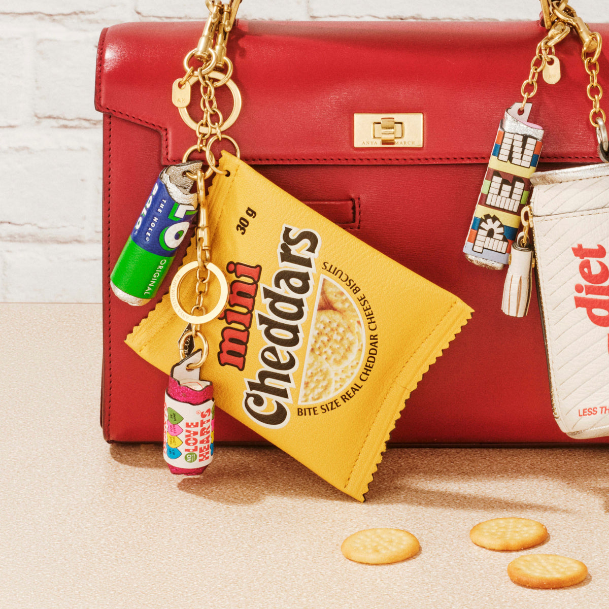 Anya Brands Jacob's Mini Cheddars Earphone Case Charm -

          
            Calf Leather in Lemon Curd Yellow -
          

          Anya Hindmarch EU
