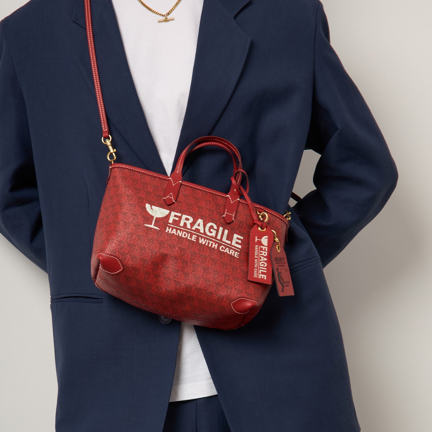 Fragile Luggage Label Charm -

          
            Capra Leather in Bright Red -
          

          Anya Hindmarch EU
